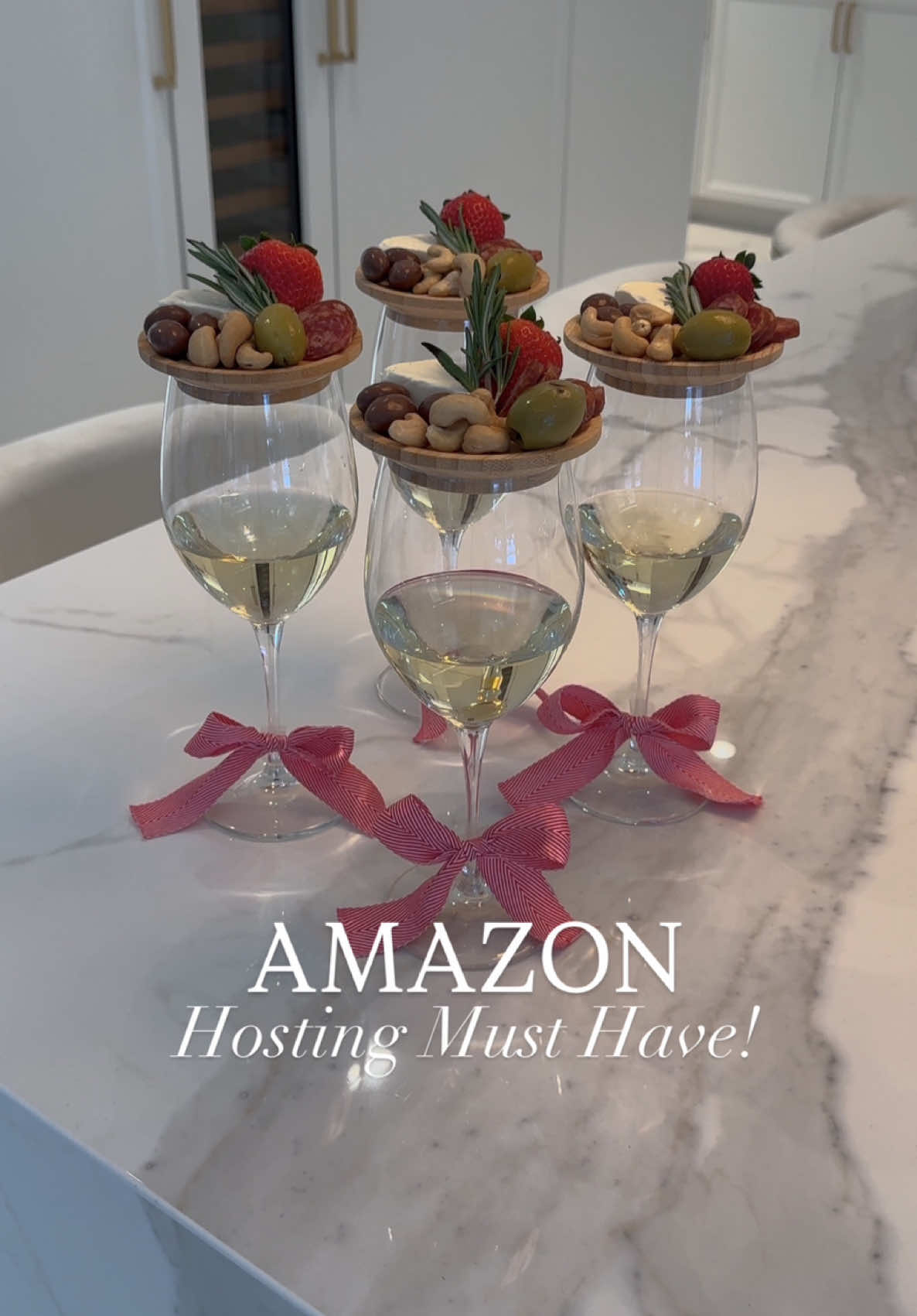 The cutest charcuterie wine glass toppers! 🍷🎀perfect for holiday gatherings or when you need a bite with your sip! 🧀 #amazonfind #holidayhome #christmasideas #hostingtips #amazonmusthaves #holidayvibes #amazonfavorites #winelover #holidayideas #charcuterieboard  Charcuterie wine toppers, Amazon hosting essentials, kitchen must-haves, holiday party ideas