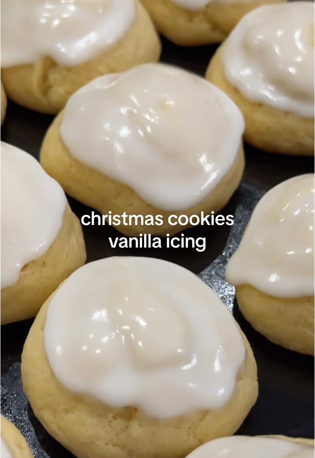 christmas cookies episode 2: cakey vanilla iced cookies🍪🧁 seriously my number one during the holidays!  Recipe: - 3/4 cup butter, melted - 3/4 cup cane sugar - 4 eggs - 2 tsp vanilla - 3 1/4 cups flour - 5 tsp baking powder  - 1/2 tsp salt Icing: - 1 1/2 cups powdered sugar - 2-3 tbsp milk Makes 27 0.5oz cookies (scooping the dough using a 1T measuring apoon). Bake at 375F for 10 mins.  #FoodTikTok #CookingTikTok #BakingTikTok #Recipe #bakingrecipe #food #Foodie #baking #christmas #cookies #christmascookies #christmasbaking #vanilla #vanillacookie #cake #cakey #cakeycookie #vanillaicing #icingcookie #sweettreat #dessert #familyrecipe #christmastime #bakedgoods #EasyRecipe #creatorsearchinsights 