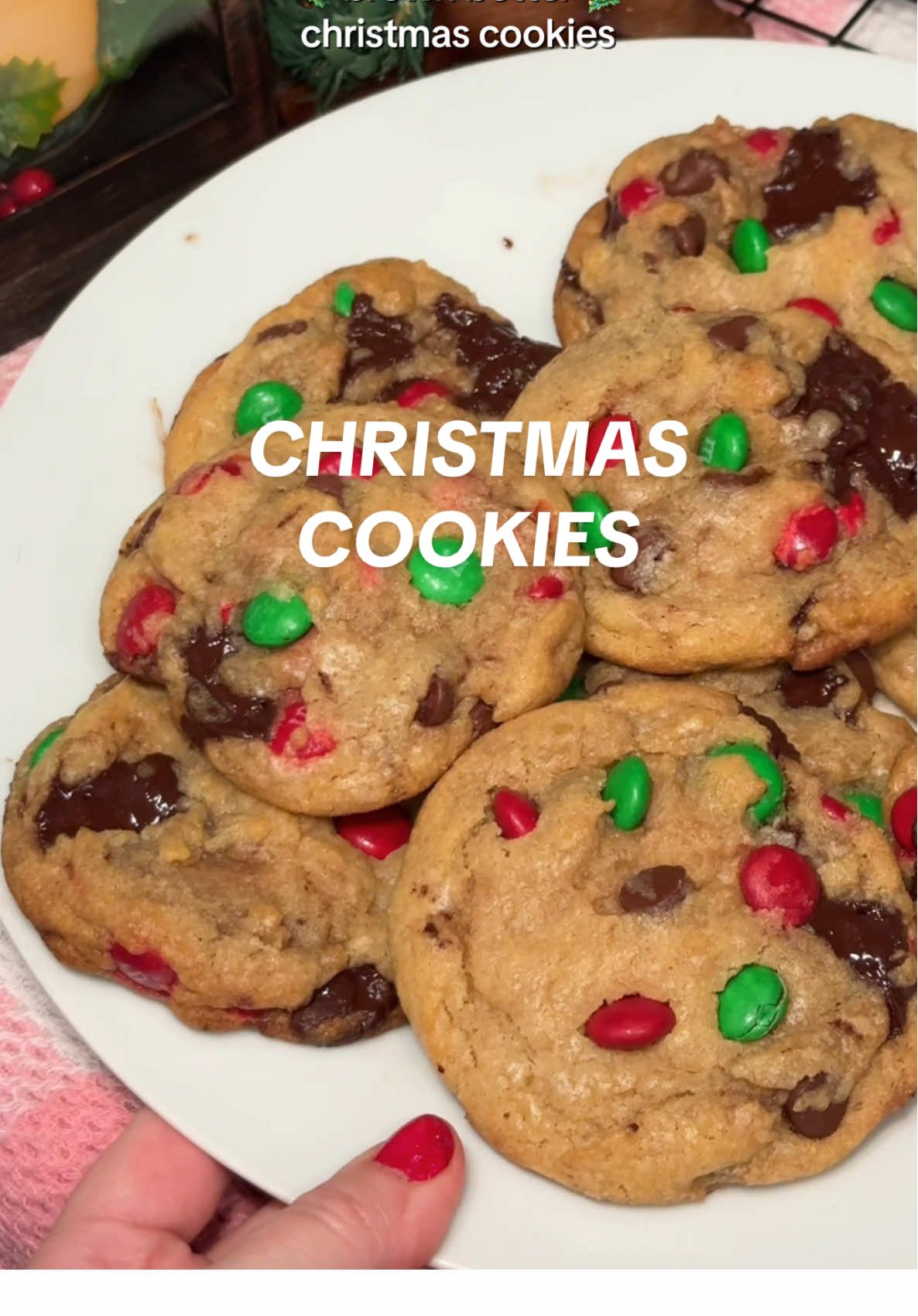 brown butter chocolate chunk christmas cookies 🎄☃️ 🤍🎀✨ recipe: Browned butter chocolate christmas cookies 🎄☃️✨ Wet Ingredients: 🎄 1 cup browned butter (cool 10 min)   🎄 1 cup light brown sugar (packed)   🎄 1/2 cup granulated sugar   🎄 2 large eggs (room temp)   🎄 2 tsp vanilla   Dry Ingredients: 🎄 2 1/2 cups all-purpose flour   🎄 1 tsp baking soda   🎄 1/2 tsp baking powder   🎄 1/2 tsp salt   Mix-ins: 🎄 1/2 cup semi-sweet chips   🎄 4 oz Ghirardelli 72% dark chocolate, chopped   🎄 3/4 cup holiday M&Ms (reserve some for topping)   Instructions: 1. Brown butter over medium heat, cool for 10 min.   2. Mix butter, brown sugar, and granulated sugar until smooth.   3. Add eggs one at a time, then stir in vanilla.   4. In a separate bowl, whisk flour, baking soda, baking powder, and salt.   5. Gradually mix dry ingredients into wet ingredients.   6. Fold in semi-sweet chips, dark chocolate chunks, and most M&Ms.   7. Chill dough for 30 min.   8. Scoop dough (2 tbsp) onto lined baking sheet.   9. Bake at 350°F for 9-11 min.   10. Press extra M&Ms on top, sprinkle sea salt (optional). Cool 5 min.   Enjoy your gooey christmas cookies and follow me for more baking, drinks, and more! ☃️🎄🤍🧸✨ @Ghirardelli Chocolate Company @M&M'S US  #christmas #baketok #baking #bakingtherapy #christmastok #Recipe #bakingtiktok #recipeideas #bakingvideo #christmastiktok #christmasbaking #dessert #christmascookies #mms #chocolatechipcookies #christmasdessert #fyp  