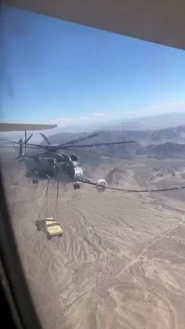 CH-53E Super Stallion carrying a HMMWV and refueling from a KC-130 Hercules. #machinepix #engineer #engineering #howitsmade #manufacturing #aviation #marines #pilot #helicopter 