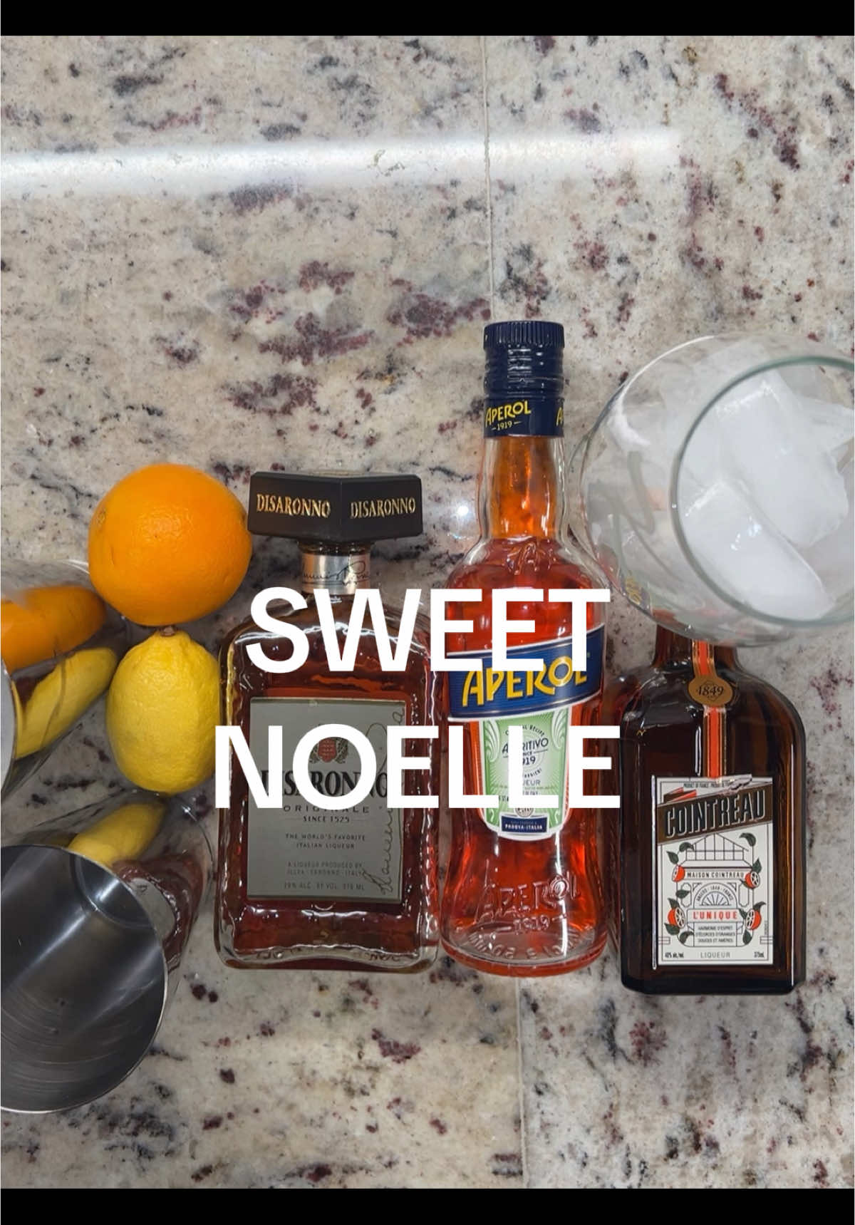 Sweet Noelle for cocktail #10 for Red Drinks for Christmas. Im clearly doing red and pink at this point 😭  This one is sweet, smooth, citrus forward and strong. Recipe: 1 half squeezed Orange 1 half sqeeuzed lemon 1 oz Aperol 1 oz Disaronno  .5 oz Cointreau 1 oz Cranberry juice Top with Soda Water Garnish with fresh fruit slices  #fypシ゚viral #mixologist #christmasdrinks #bartendersoftiktok #drinkrecipe #easydrinks #serverlife #aperol #disaronno #foryoupage 