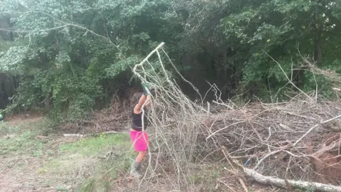 Doing some manual labor moving tree trimmings to the brush pile. A big high five to our almost 10 year old dragging the biggest branch to the pile herself. #martinezfamilyhomestead #brushcleanup #homesteading #treemanagement #landmanagement #waytogowednesday #thatwaseasy