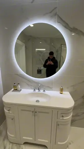 A touch of modern luxury: Round LED Backlit Mirror 🤩🪞 #inyouths #ledmirror #mirror #led #inyouthsledmirror #bathroomremodel #bathroomdecor #interiordesign #bathroom #inyouthsmirror #homedecor #MorningGlowUp #BathroomGoals #mirrors #InyouthsUpgrade #modernhome #bathroomdesign #homeimprovement 