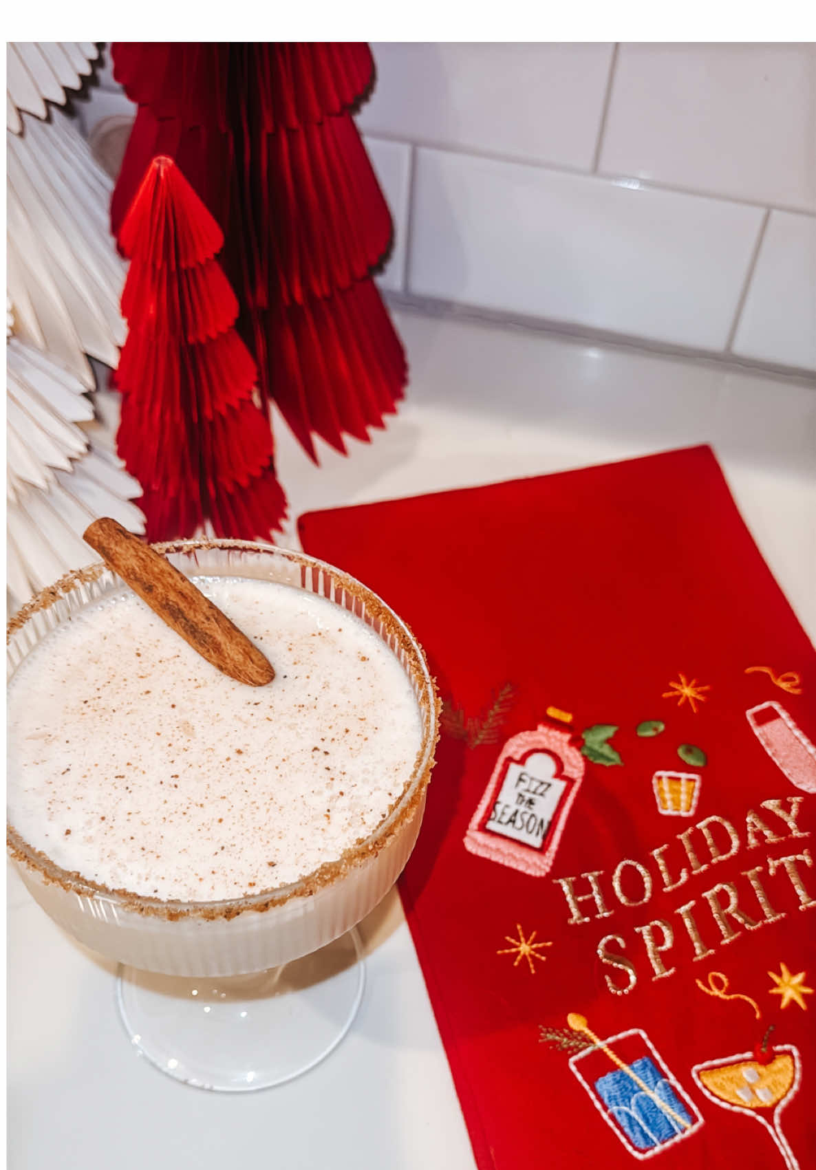 eggnog…do you love it or hate it? I always like to have one glass of it at Christmas time and this eggnog martini was a great way to spice things up. and it was super easy to throw together. recipe below🎅🏼 in a shaker filled with ice add: -2 oz amaretto  -2 oz vanilla vodka -4 oz eggnog  shake vigorously and strain into a nutmeg, brown sugar rimmed coupe glass. garnish with a dash of nutmeg and cinnamon stick.  #christmas #Recipe #cocktailrecipe #martini #drinks #holidays #christmasdrink #cocktails 