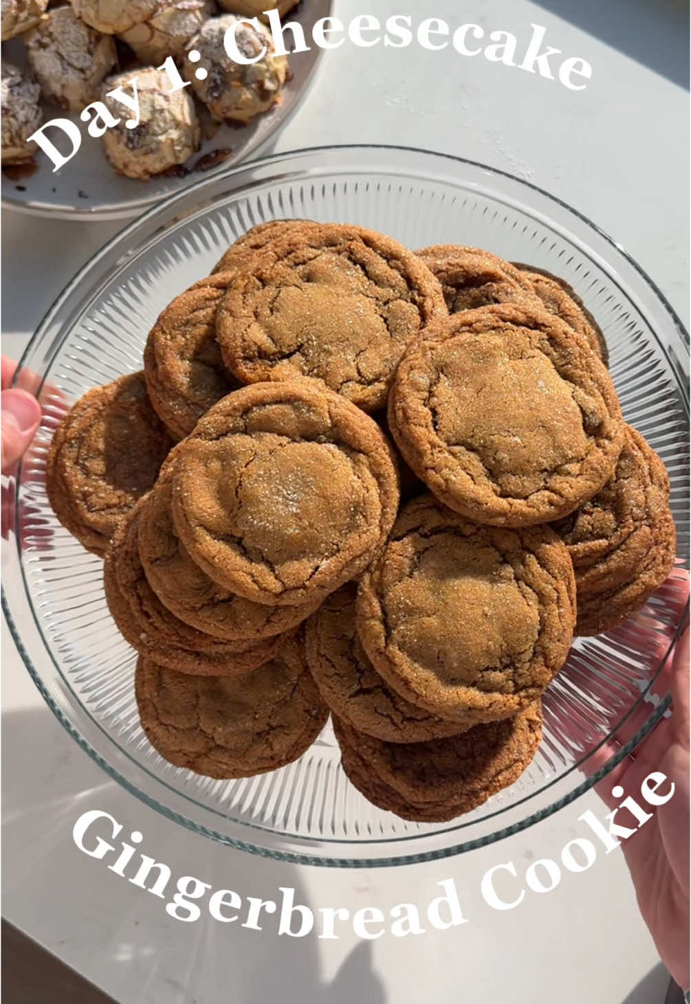 nyt day 1: gingerbread cheesecake cookies 🎄 comment something festive to make sure you see the rest of the cookie week posts ‼️ @NYT Cooking  RECIPE FOR THE FILLING: 6 ounces/170 grams cream cheese, chilled 1⁄2 cup/62 grams powdered sugar 1 large egg yolk 2 teaspoons vanilla extract FOR THE DOUGH: 2 1⁄2 cups/320 grams all-purpose flour 1 tablespoon ground ginger 2 teaspoons ground cinnamon 1 teaspoon baking soda 1⁄2 teaspoon freshly ground black pepper 1⁄2 teaspoon kosher salt (such as Diamond Crystal) 10 tablespoons/141 grams salted butter, at room temperature 1 cup/200 grams granulated sugar 1 large egg 1⁄2 cup/62 grams crystallized ginger, finely chopped 1⁄3 cup/113 milliliters unsulphured molasses 2 tablespoons finely chopped fresh ginger (no need to peel) Step 1 Prepare the filling: In a large bowl, using an electric mixer on medium-high, beat together cream cheese, powdered sugar, egg yolk and vanilla until smooth. Transfer mixture to a piping bag or resealable plastic bag. Step 2 Set a sheet of parchment on a rimmed baking sheet. Snip off a 1⁄4- inch opening from the bottom corner of the bag. Pipe equal-size dollops of the filling — you should have at least 18 — onto the prepared sheet. Using a spoon, smooth down any sharp edges. Freeze until completely firm, at least 1 hour. Line 2 more rimmed baking sheets with parchment. Step 3 Prepare the dough: In a large bowl, whisk together flour, ground ginger, cinnamon, baking soda, pepper and salt. In a second large bowl, using an electric mixer, beat butter and sugar on medium until pale and fluffy, 3 to 4 minutes. Beat in egg, crystallized ginger, molasses and fresh ginger, scraping the sides as you go. With the mixer on low, beat in the flour mixture until well combined. Step 4 Scoop dough into 2-inch/45-gram balls. (To portion the dough without a cookie scoop, form it into a rectangle, then use a sharp  1⁄2 cup/62 grams crystallized ginger, finely chopped 1⁄3 cup/113 milliliters unsulphured molasses 2 tablespoons finely chopped fresh ginger (no need to peel) White sanding sugar or granulated sugar, for rolling (optional) knife to cut the block into 18 equal pieces.) Working with one at a time, flatten a dough ball in the palm of your hand, then add a piece of frozen filling to the center. (Keep the rest of the filling in the freezer as you work.) Bring the dough up and around the filling, encasing it completely. Roll the dough ball between your hands to form it into a smooth sphere. Repeat with the remaining dough and filling. If the dough feels very soft, chill it for about 15 minutes. Step 5 Heat oven to 350 degrees. Roll each chilled ball in sanding sugar to coat, if you like, then place on the prepared sheets, at least 3 inches apart (they will spread). Bake, rotating sheets halfway through, until the center of each cookie is just set, 15 to 17 minutes. Repeat with any remaining cookies. Let cool on baking sheets for 5 minutes, then move to wire racks to cool completely. Cookies will keep, stored in an airtight container at room temperature, for up to 3 days. . . . . #Recipe #viral #layercake #privatechef #aesthetic #cheesecake #cookbook #layercake #newyorkfood #cookies #nyc #newyork #cookie #nytcooking #cookies #nycfoodie #nycfoodblogger #nycfood #gingercheesecake #eastvillage #nytcookieweek #cookbookbanquet #cake #cookieweek #event #christmas #nycevent #nytcooking

