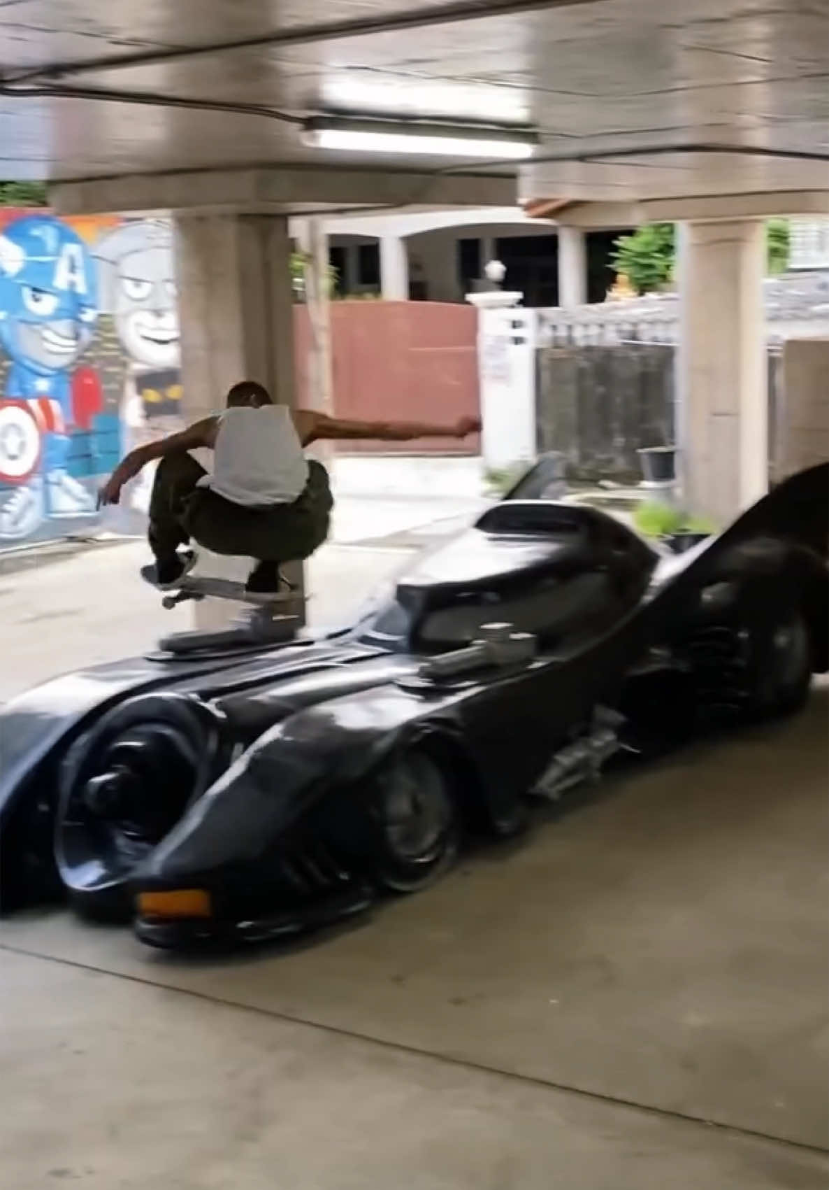 Ollie over the Batmobile 😳🔥 (IG: moticpanugalinog) #sports #Skateboarding #professional #skatelife #skatetok #skateboardingisfun #viral 