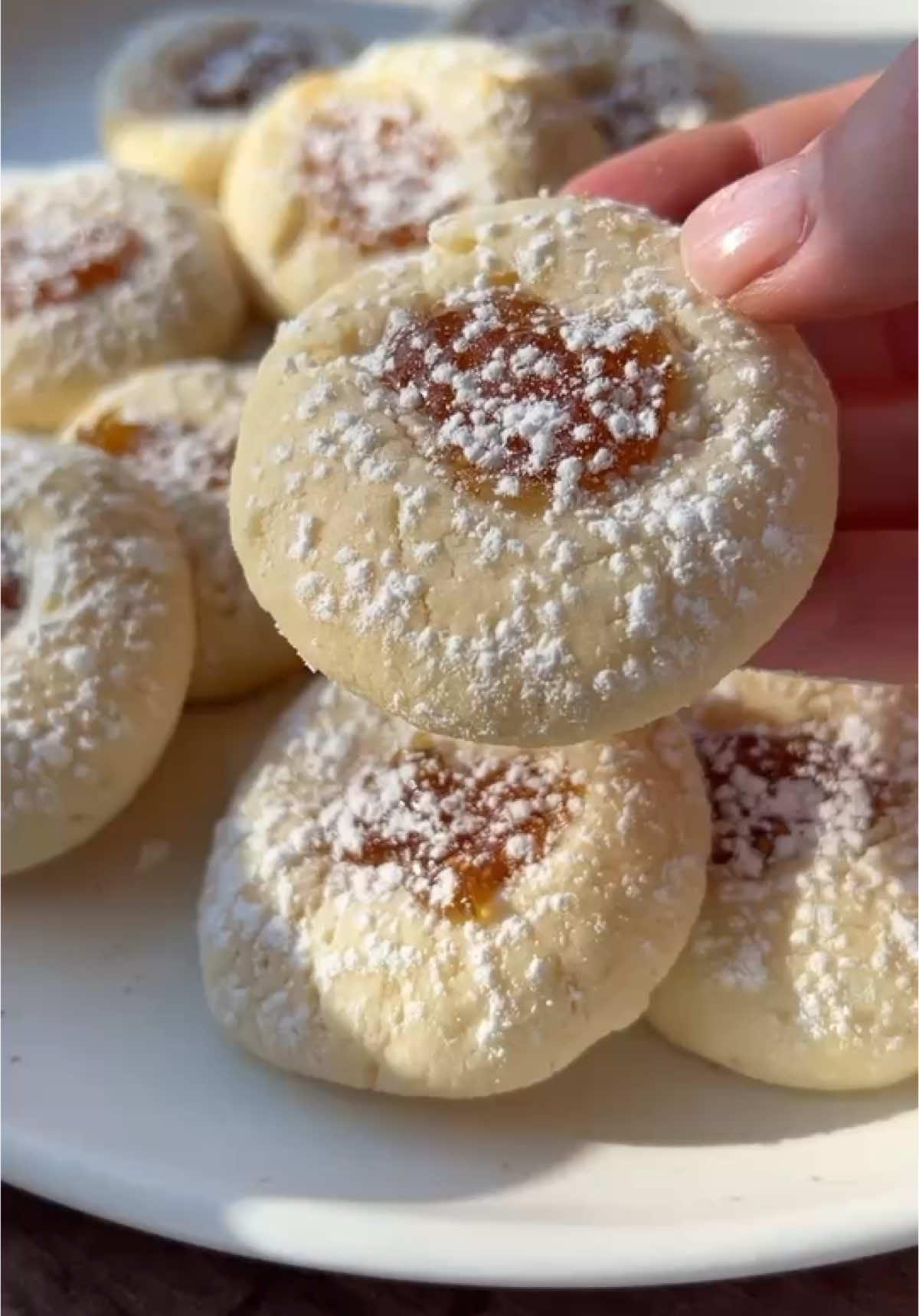 ✨Lemon Cheesecake Thumbprint Cookies✨ My lemon cheesecake thumbprint cookies melt in your mouth. This recipe is one of those recipes that you’ll need to triple, because it’s THAT good. 🍋Whether you’re a lemon lover or simply looking for a unique and delicious cookie, these Lemon Cheesecake Thumbprint Cookies are a must-try. They’re perfect for any occasion, from a casual afternoon tea to a fancy dessert spread.  Ingredients ½ cup cream cheese, softened ½ cup white sugar 1 stick softened salted butter 1.5 teaspoons lemon extract, optional if you don’t have any on hand 1 ¼ cup all-purpose flour, + 2 extra tablespoons for rolling the balls 18 teaspoons jam, I used fig preserve https://themodernnonna.com/lemon-cheesecake-thumbprint-cookies/  #cookies #christmascookies #holidaycookies #cheesecakecookies #lemoncookies #recipetok