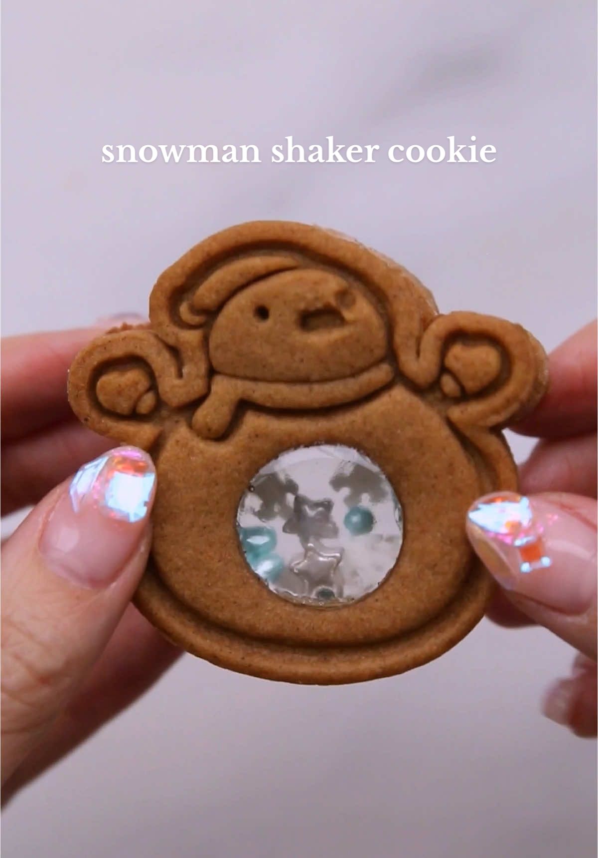 snowman shaker cookies, filled with snow flakes and silver stars ❄️ #holidaybaking #holidaycookies #christmascookies #christmasbaking #snowmancookie 