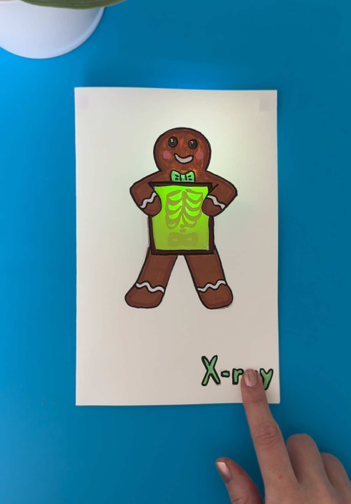 DIY “Gingerbread x-ray” interactive light-up card. Easy and fun paper circuit project for beginners.  You will need: - LED diode - Conductive copper tape  - Coin cell battery 3v (CR2032) - Paper - Markers  Warning: this project should be done under adult supervision. Order supplies here: https://www.amazon.com/shop/moonshotkidz #stemlearning #stemeducation #stemteacher #stemactivities #science #papercircuit #papercraft #crafts #womeninstem 