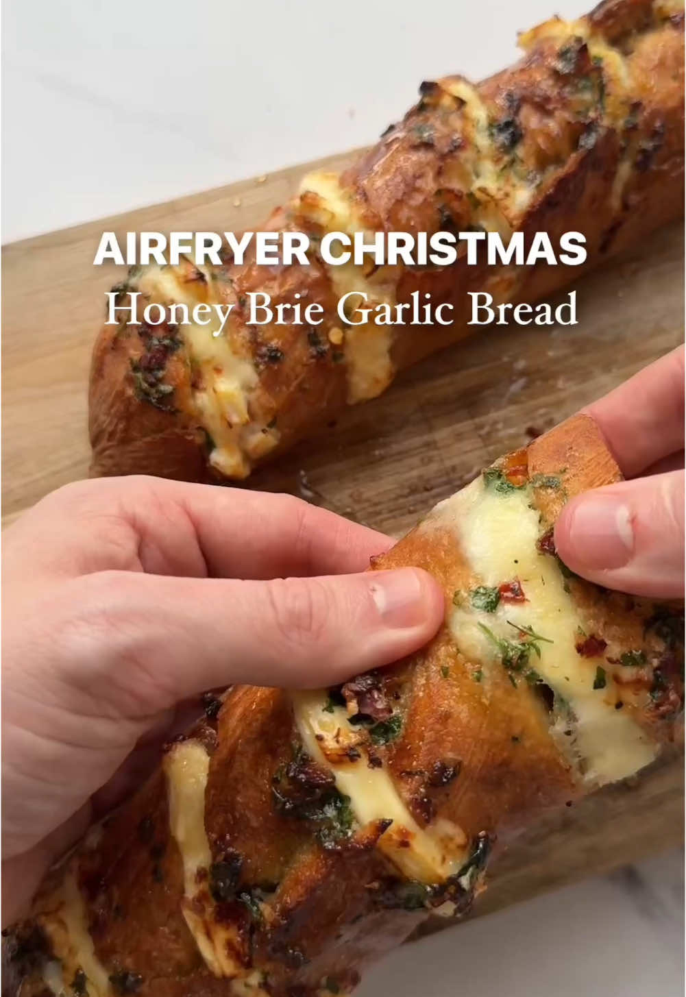 Airfryer Brie, Bacon & Honey Garlic Bread 🍯    A garlic bread with Brie & bacon to give it some festive OOMPH. The sweetness from the honey really takes it up a level.  PS my new book Six Ingredient Slowcooker is out NOW! Link in my bio.   Ingredients:  - Sourdough baguette  - 50g low fat butter  - 4 garlic cloves, crushed  - Handful of fresh parsley   - Handful of cooked bacon bits   - 2 tbsp honey  - 100g brie, sliced  - 50g hot honey, to serve  - Salt and pepper    Method:     1. Slice your sourdough (I cut about 8 slices into ½ baguette)   2. Prepare your butter by mixing your butter, honey, garlic, parsley and bacon bits, salt and pepper  3. Spread the garlic butter mixture into each slice and then top with some brie  4. Air fry at 190 for 8 minutes and serve with some hot honey   Enjoy 😊    #boredoflunch #festive #festiverecipes #christmas #christmasfood #brie #honey #garlicbread #airfryer #airfryerrecipes #airfryerrecipe #festivefood #crunch #crunchy #garlic #butter #cheese #bacon #cheesepull #like #share 