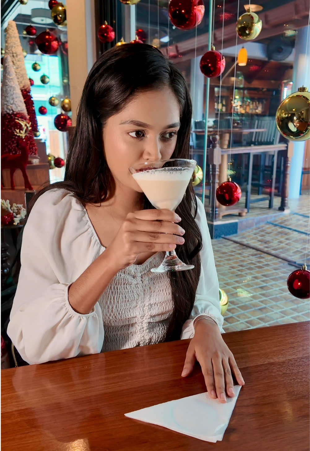 Chandini tries one of our seasonal cocktails - the Creamy Coconut Martini! Only available for the Christmas season, this cocktail is a delightful blend of coconut and almond. Come give it a try while it's available! #cocktails #seasonalcocktails #coconut #martini #guyanatiktok #christmas #guyanesechristmas 