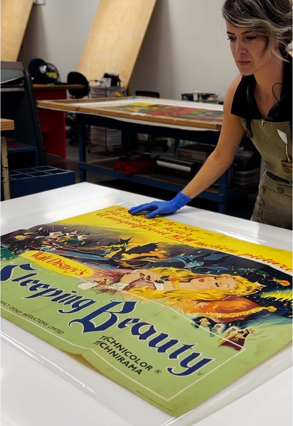 Linen backing and restoring a Sleeping Beauty movie poster 👸💤
