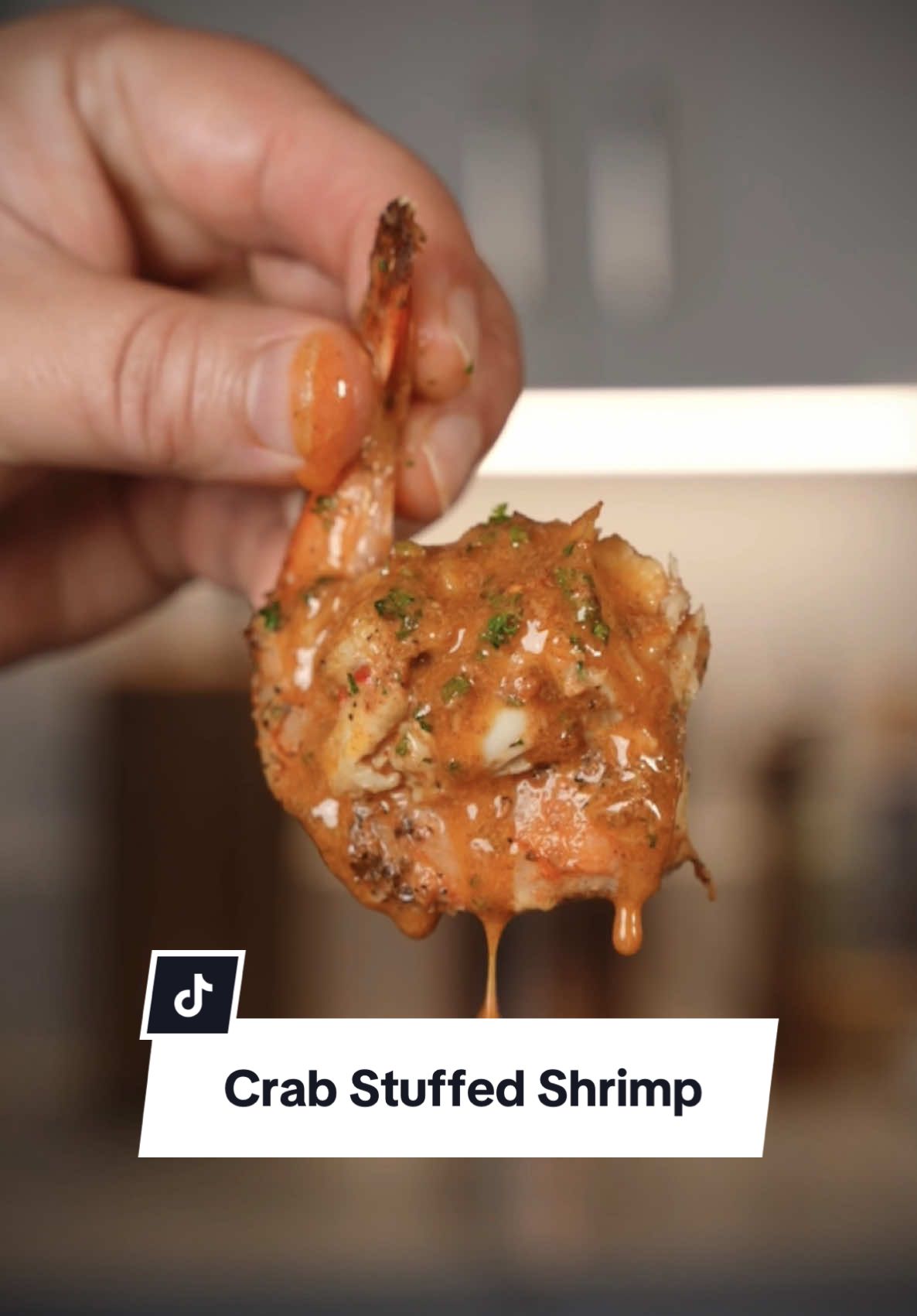 Crab Cake Stuffed Shrimp 🦀🍤 Recipe ⤵️⤵️⤵️ Recipe Makes 34  For the Crab Cake Stuffed Shrimp: 34 Shrimp ~13-15 per pound 1 lb Lump Crab Meat 6 Tbsp Cajon Seasoning 3 Eggs 1/3 Cup Mayo 1 Tbsp Salt 2 Tbsp Dijon 1/4 Cup Chopped Parsley 1 Sleeve Crushed Ritz Crackers 1/2 Red Bell Pepper 1 Lemon How to in my @Weber Grills SearWood: 1. Clean Shrimp and Season with 4 Tbsp Cajon seasoning 2. In a Bowl whisk eggs first, then add Mayo, 2 Tbsp Cajon seasoning, Salt, Dijon, Parsley, and whisk all together  3.  Add Mixture over Crab, and add crushed Ritz Crackers, Bell Pepper, and fold in ingredients  4. Form little balls and place in the center of the shrimp 5. Add to a skillet and squeeze Lemon on top 6. Set Weber SearWood to 450 degrees and cook until Shrimp and Crab read 145 degrees (Approximately 12-15 min) For the Cowboy Butter:  12 ounces Butter  1/2 Lemon  1 Tbsp Minced Garlic  1 Tbsp Lemon Zest  1 Tbsp Dijon Mustard 2 Tbsp Paprika  1 Tsp Cayenne 2 Tbsp Parsley  1 Tbsp Chives 1 Tbsp Red Pepper Flakes  How to on my Weber Slate: 1.  In a pan on low heat add Butter, Lemon Juice, Garlic, Lemon Zest, Dijon, Paprika, Cayenne, and whisk until it forms a sauce. (Do not let it break) 2. Turn off the heat and add Parsley, Chives, and Red Pepper Flakes. Mix until well incorporated.  Pro tip: If the sauce breaks, add in the fridge to cool. You will be able to make it thicken and turn back into a sauce!  #crab #cake #stuffed #shrimp #Recipe #holiday #ideas #weberpartner #weber 