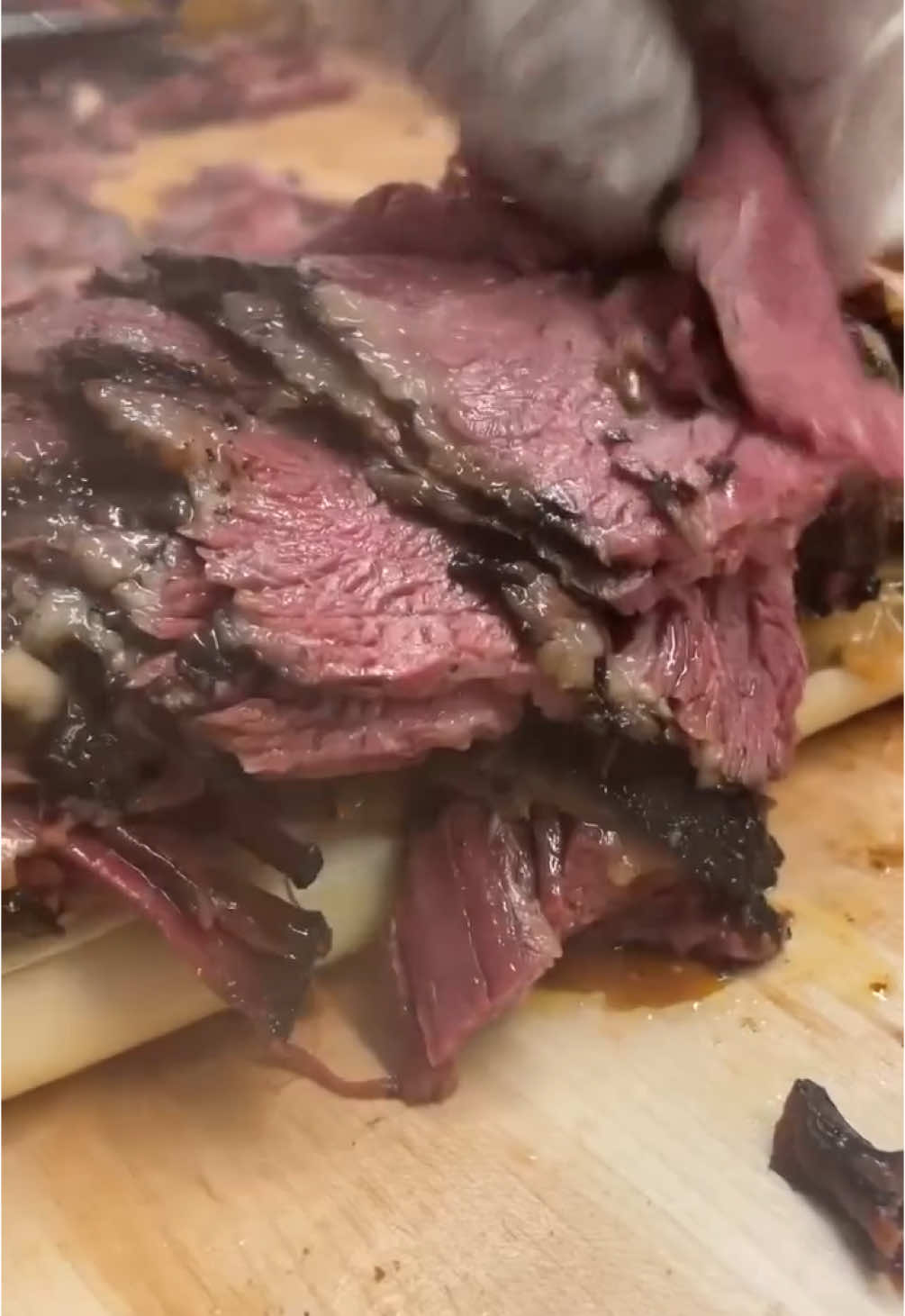 Most Legendary Restaurants in the World: Katz's Delicatessen, USA 🇺🇸  Video: @katzsdeli  Katz's Delicatessen is the world's #8 most legendary restaurant, among 23,952 eateries, based on more than 400,000 votes.  The Pastrami Reuben at Katz's Delicatessen is a culinary icon and a piece of New York City's history, reflecting the rich cultural melting pot of the Lower East Side. Since its opening in 1888, Katz's has been a staple of the city, with its Pastrami Reuben symbolizing the fusion of Jewish deli tradition and American flavors, beloved by generations of New Yorkers and visitors alike.