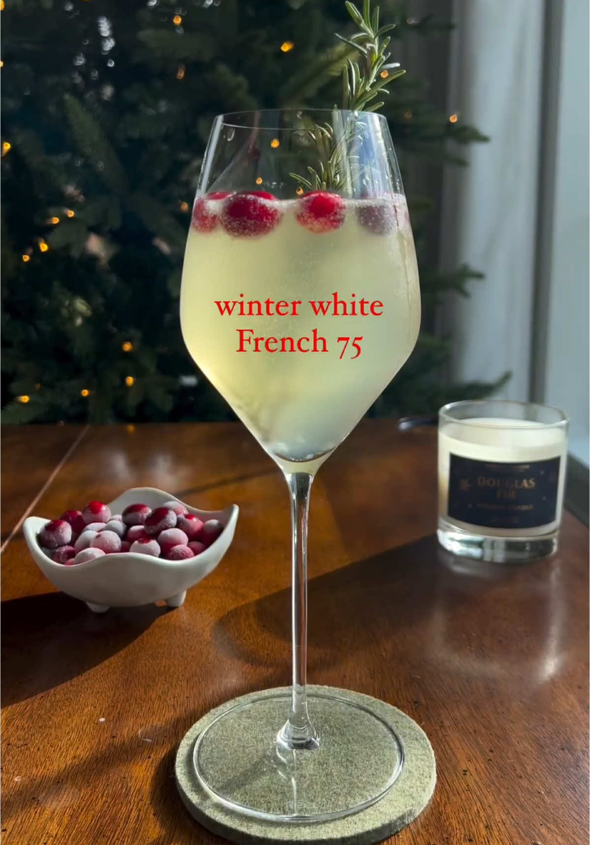 WINTER WHITE FRENCH 75 Not all my cocktails turn out perfect, especially when the bubbles are flat! 😂 At least she’s pretty!  This one has so much potential… when the bubbles are bubbly. 😂 I recommend you trying this with a fresh bottle of champs or prosecco. But, if all you’ve got is flat bubbles, they’ll kinda work, too. Cheers! 🥂 Here’s what you’ll need: 1.5 oz. gin (I used @hendricksgin) 1/2 oz. fresh squeezed lime juice 1/2 oz. Rosemary simple syrup 1.5 oz. white cranberry juice Prosecco or Champagne to top it off Add all the ingredients into a glass and give it a gentle stir. Top with more bubbles and garnish with a rosemary sprig and frozen cranberries. Cheers! 🥂 . . . . #french75 #holidaycocktails #cocktails #cocktailsathome #bubbles #champagnecocktails #champagne #prosecco #kyginger #kentuckyginger #gin #gincocktails #pov #reallife