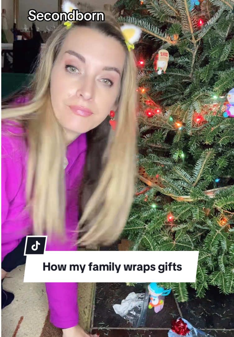 Family Gift Wrapping | IYKYK with that glide. Which one are you? #gifts #firstborn #secondborn #parents #momhumor #kidsvsparents #familyoffour 