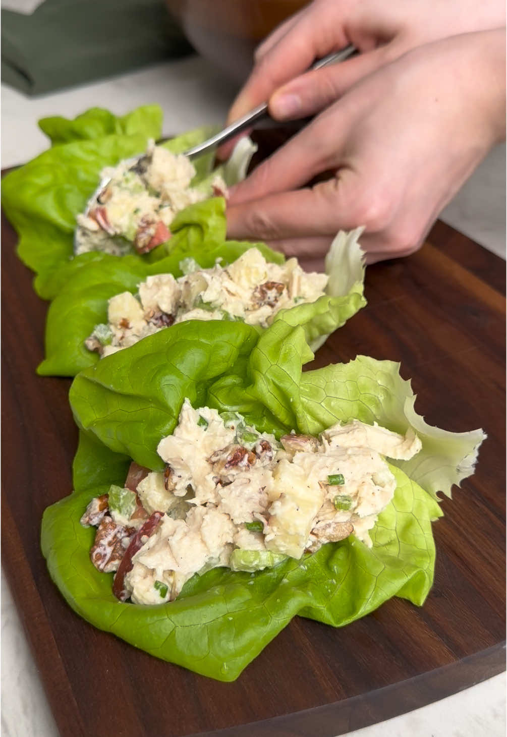 APPLE PECAN CHICKEN SALAD 🍎🥗 Ingredients: 1 lb cooked chicken breast (16 oz) chopped or shredded 3/4 cup celery (75 g) finely chopped 1 medium honey crisp apple (182 g) finely chopped 1/3 cup roasted pecans (40 g) roughly chopped 1/4 cup green onion (18 g) thinly sliced 1/4 cup light mayo (60 g) 1/4 cup non fat plain greek yogurt (57 g) 1 tbsp apple cider vinegar (15 g) 1 tbsp dijon mustard (15 g) 1/2 tbsp honey (10 g) 1/4 tsp salt 1/4 tsp pepper Instructions: 1. Add all ingredients from chicken to green onion in a large bowl. 2. Make the dressing by whisking together all ingredients from mayo to pepper. 3. Pour the dressing over everything and stir until fully combined. Season with any more salt and pepper to taste. Enjoy! Notes: • I like to finely chop the celery and apple for even texture and to get a little in every bite. • If you’d like to make your own roasted pecans, add raw pecans to a parchment lined baking sheet, toss with a small drizzle of olive oil, pinch of sea salt and bake at 350 F for 9-12 min until toasted and fragrant. You could also use the stove to toast them for about 3-5 minutes. Per serving: (makes 6) 212cals/25P/8C/10F For full printable recipe, search 🔍 “apple pecan chicken salad” at myproteinpantry.com or at the 🔗 in my bio. Don’t forgot to follow for more easy high protein recipes and tag me if you make it! 🫶🏼 #EasyRecipes #highprotein #apple #pecan #chicken #salad #macrofriendly #macrofriendlyrecipes #healthylifestyle