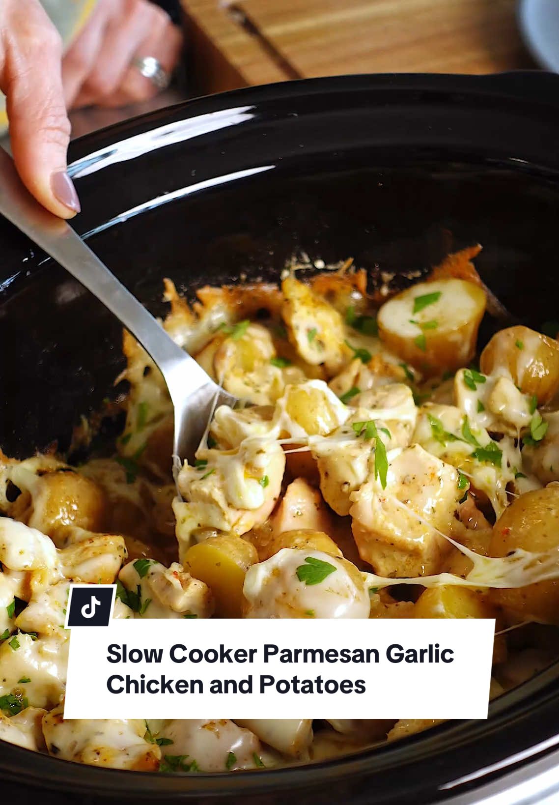 Next up on our countdown to the New Year is @NicoleMcLaughlin’s take on this Slow Cooker Parmesan Garlic Chicken and Potatoes. 😮‍💨 At first, we didn't believe so few ingredients could pack this much flavor, but we were SERIOUSLY mistaken.  Ingredients - 2 pounds potatoes, cut into 1 ½- to 2-inch chunks - 2 tablespoons olive oil - 1 teaspoon kosher salt - 3/4 teaspoon ground black pepper - 1/2 teaspoon paprika - 2 pounds skinless, boneless chicken breasts, diced into 1 ½-inch pieces - 1 cup creamy Parmesan garlic sauce, such as Buffalo Wild Wings Parmesan Garlic Sauce - 1/2 cup water or chicken stock - 2 cups shredded mozzarella cheese - 1/4 cup grated Parmesan cheese (optional) - 1 tablespoon chopped fresh parsley, or to taste (optional) Directions 1. Combine potatoes, olive oil, 3/4 teaspoons salt, 1/2 teaspoon black pepper, and paprika in the bottom of a slow cooker and stir until well coated. Add chicken pieces on top and sprinkle with remaining salt and pepper. Whisk Parmesan garlic sauce and water together in a bowl until well incorporated. Pour mixture over chicken and potatoes. 2. Cook on High for 4 hours (or on Low for 6 hours), or until chicken is cooked through and potatoes are tender. During the last 20 minutes of cooking, add mozzarella and Parmes #garlicparmesanchicken #buffalowildwingssauce #crockpotmeals #cheapdinner