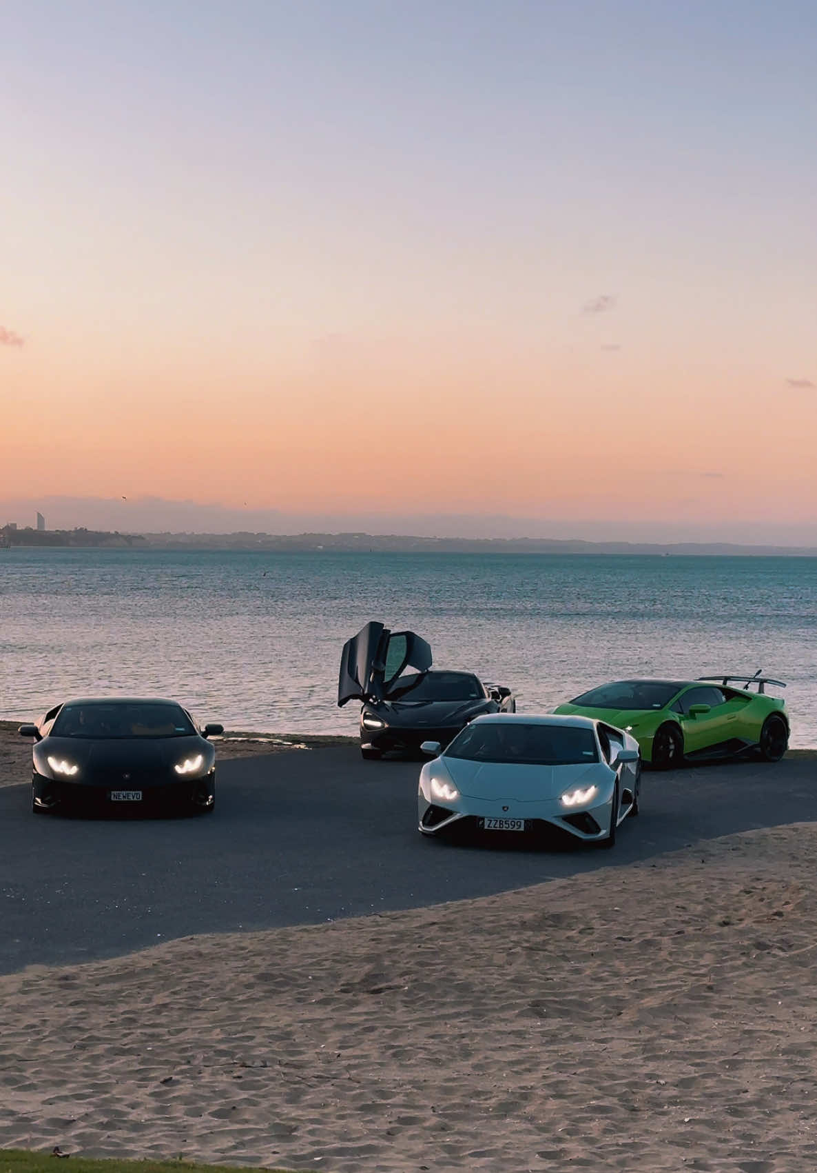 Cant wait for peak summer again 🙏 #Summer #Beach #Lamborghini #Mclaren #Huracan #Evo #720s #sunset #auckland #newzealand #carsoftiktok #dontletthisflop #fyp #viral #ab1cars