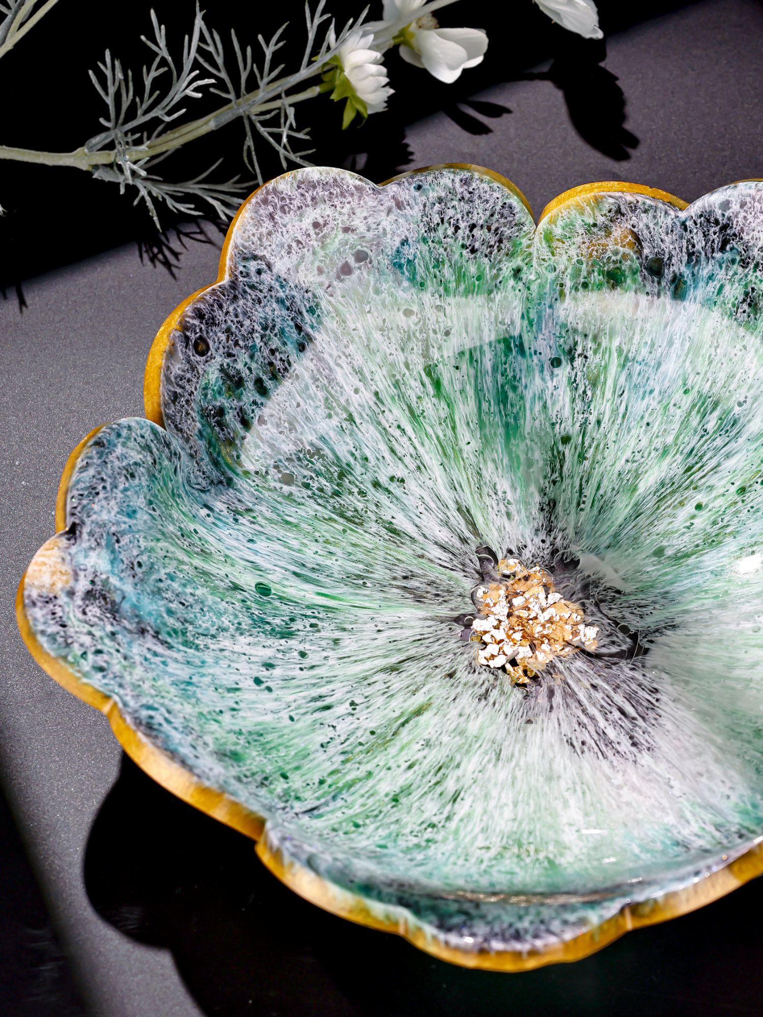 Inspired by the mysterious waves of the ocean crashing against emerald reefs, each swirl and bubble tells an ancient story.#CreativeLiving #ResinArt #HealingCreations #NaturalStyle #epoxyresin #HeyClear