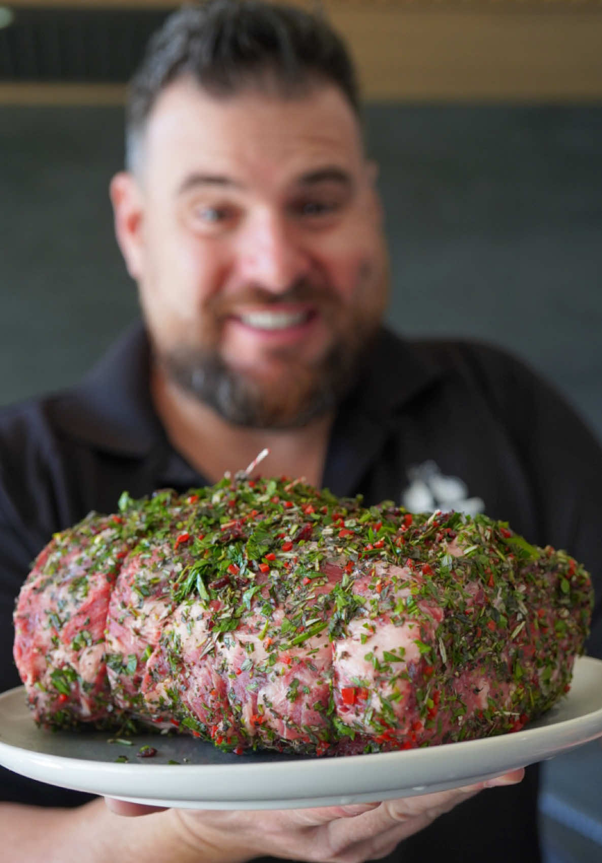 Herb Crusted Christmas Roast 🎄 Let this Harvey Beef scotch fillet roast be the star of your Christmas feast with our latest recipe below 😊 Rolled in plenty of delicious Christmas colours then roasted in the oven this is a must-try. Recipe below; - Remove any silver skin from the outside of the 2kg scotch fillet roast. - Apply a light layer of olive oil then season all sides with plenty of salt and cracked pepper. - For the herb crust finely chop fresh Italian parsley, oregano, rosemary, thyme, red chilli and cranberries. - Add all of the chopped ingredients to a tray, mix together and lay out flat. - Place the seasoned roast ontop of the bed of herbs and roll until all sides are covered. - Twine the roast tightly to maintain an even cook then place on to a roasting rack. - Add a halved bulb of garlic to the tray and drizzle olive oil over the roast and garlic. - Place in to a preheated oven set to 180C for roughly 1.5hrs. - Once the roast has hit an internal temp of 54C at both ends remove and allow to rest for 15 minutes. - Slice in to thick steaks then spread the roasted garlic over the top. - Serve alongside your favourite Christmas sides and enjoy 😊  #cheatmeats #harveybeef #christmas #roast #bbq #meat #roastbeef #ribroast #ribeye #barbecue #steak #ribeyeroast #christmasrecipes #beef #australianbeef #carnivore #perthfood #keto 