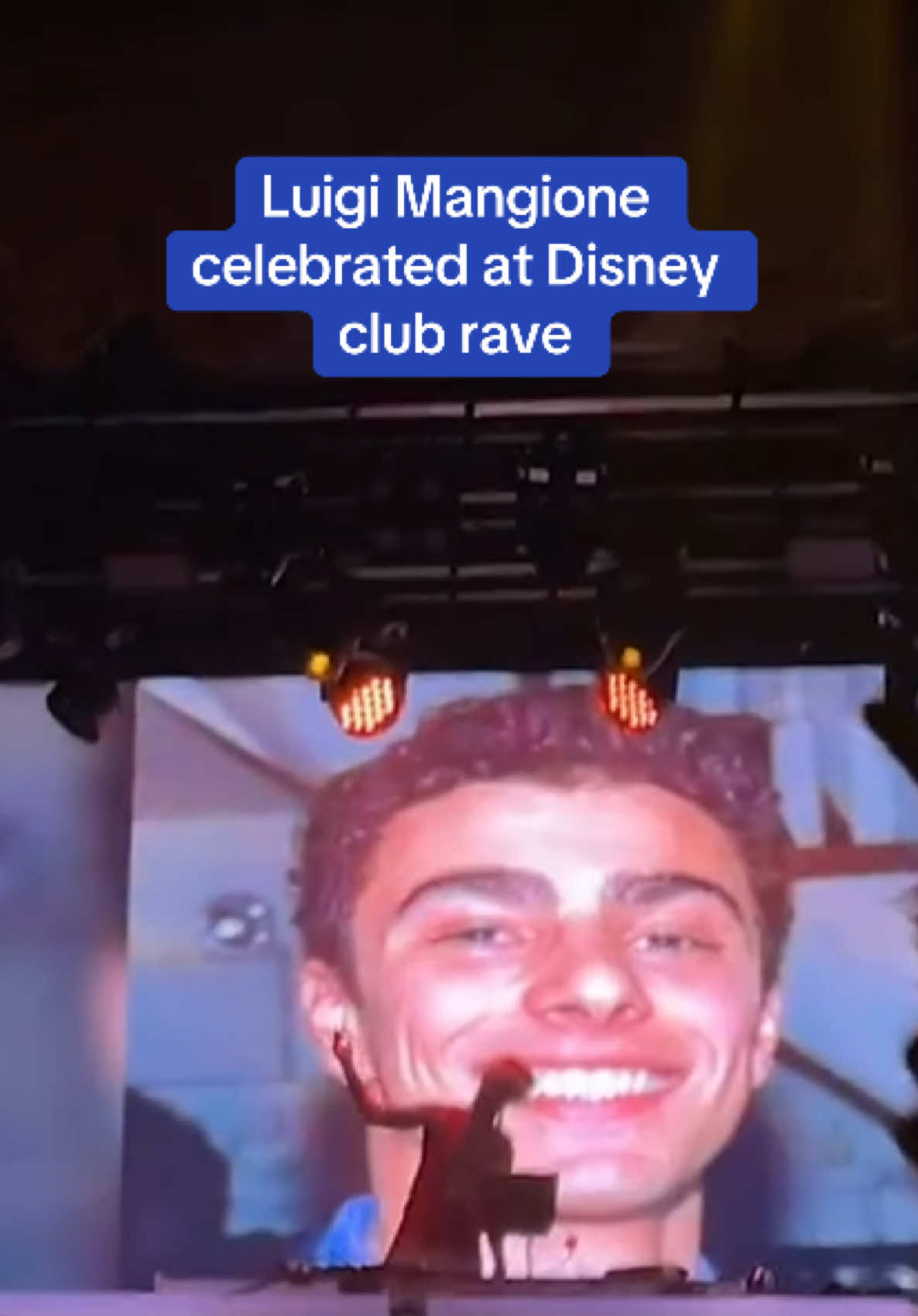 Fans at a Disney music dance party in Boston captured the moment photos of Luigi Mangione were used as a backdrop while the Hannah Montana song He Could Be the One played. Mangione has been charged with first-degree murder after he was accused of killing UnitedHealthcare CEO Brian Thompson on December 4.  Video from the event show the DJ behind the deck, with photos of Mangione on display as the crowd cheered him on. 🎥 nessaa1027 via TikTok #disney #rave #CEO #luigimangione #party #hannahmontana  