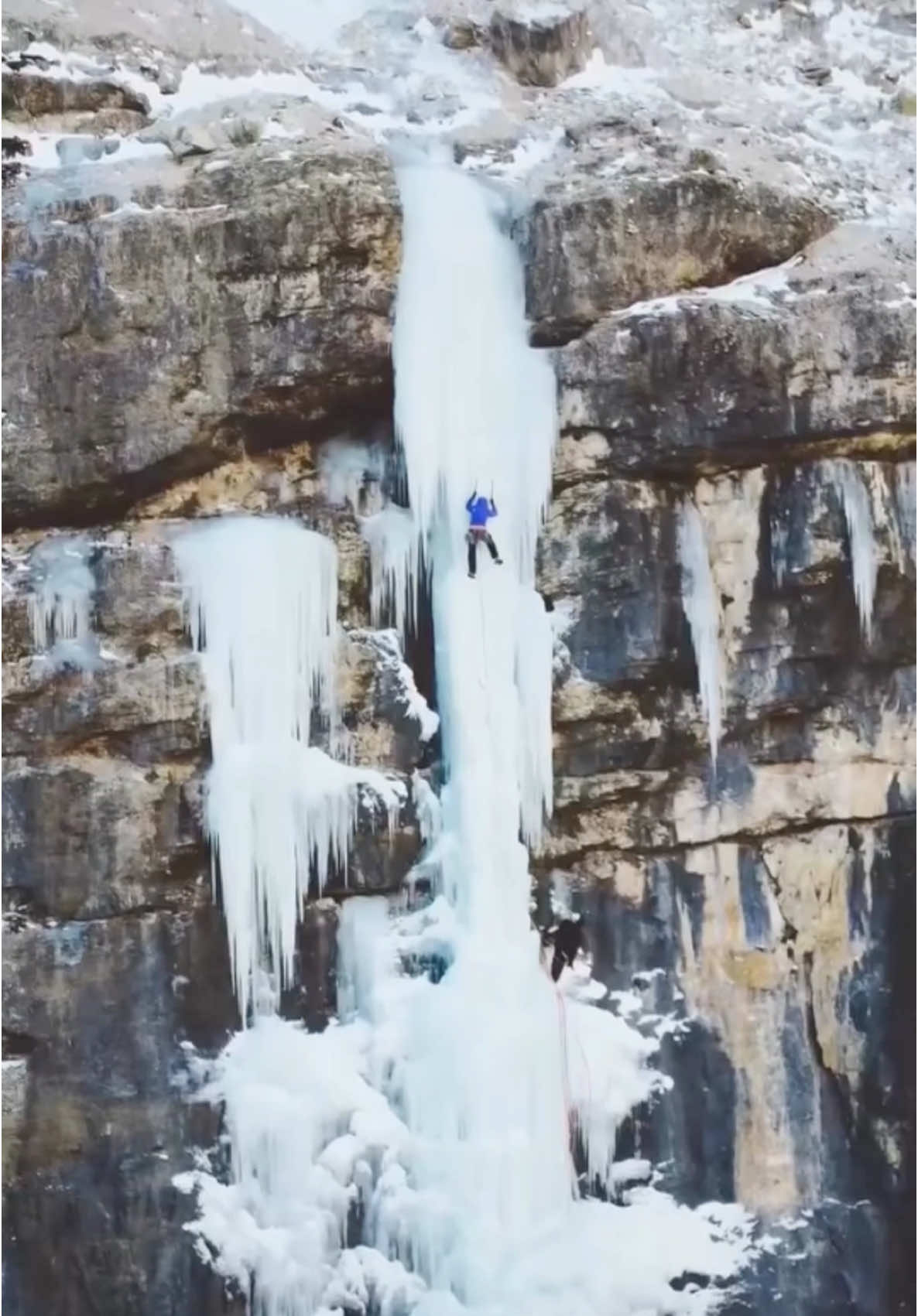 How far up are they climbing this frozen ice? #iceclimbing #climbing #adventure #mountains #explore 📽 Greg Boswell
