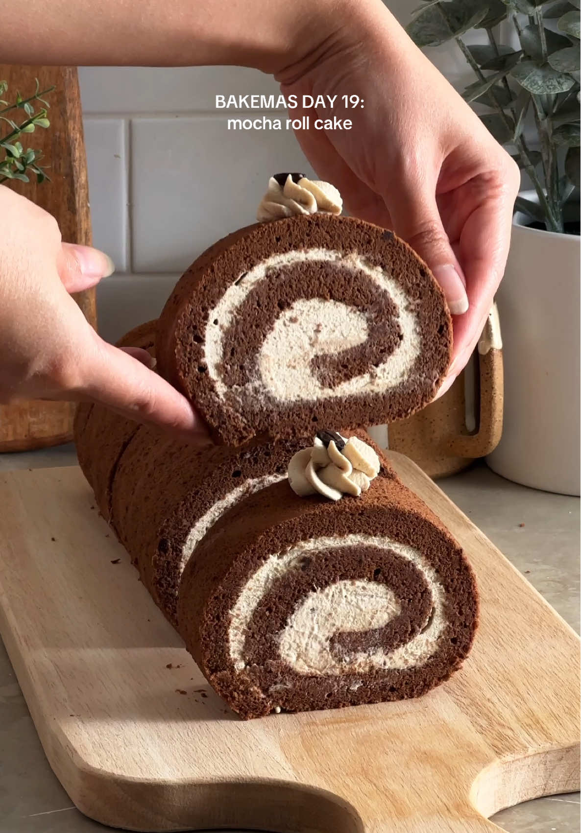 BAKEMAS DAY 19: mocha roll cake 🤎 soft and fluffy mocha chiffon rolled up with espresso whipped cream. this roll cake is for anyone who prefers a deeper flavour to my usual fruity rolls! and it would be a great one to make as a yule log! 🥹 recipe linked in my bio or search “mocha roll cake” on teakandthyme.com ✨ #mocha #rollcake #swissroll #yulelog #buchedenoel #holidaybaking #christmasbaking #christmasdessert #holidaydesserts #baking 