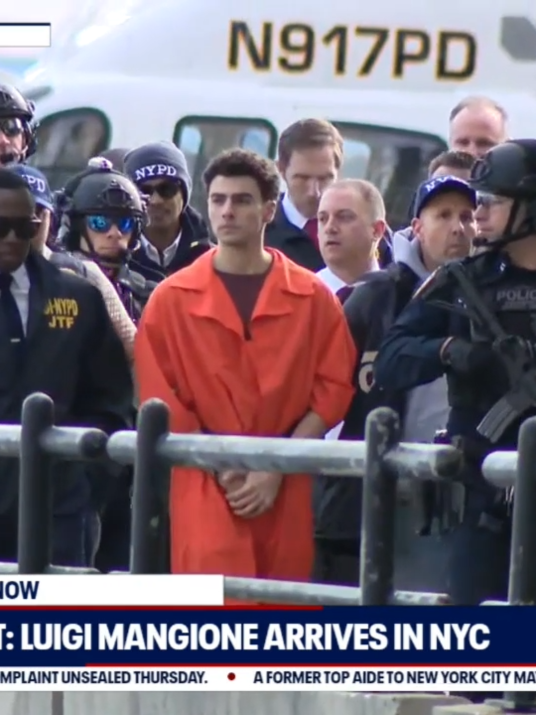 After a helicopter carrying alleged CEO killer Luigi Mangione landed in Manhattan, he was escorted by officers with assault rifles and taken to a federal courthouse.