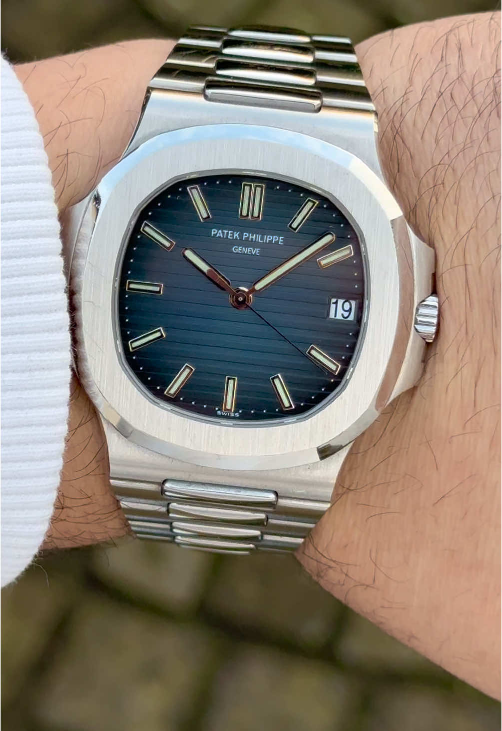 Introducing an icon of horology: the Patek Philippe Nautilus Blue Dial 2007 - 5711/1A-010.   With its unmistakable blue dial, stainless steel case, and bracelet, this 40mm masterpiece represents the pinnacle of timeless design and craftsmanship. Produced in 2007, this Nautilus carries both prestige and history, making it a sought-after collector’s piece. Delivered with its original box and papers, this well-maintained gem is a rare opportunity to own one of the most coveted models in the watch world.   #PatekPhilippe #Nautilus #LuxuryTimepiece #TimelessDesign #MarcGebauer #watchcollector 