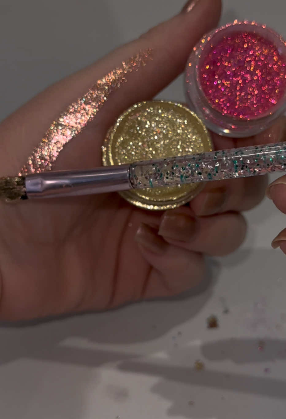 Mixing our glitters glamour & fantasia with our magic potion to create a rose gold liquid glitter eyeshadow ✨💫 It’s so much fun creating my own unique shade by mixing any colours together 😍  #makeuptips #makeuptipsandtricks #makeuphacks #makeuptrends #glittermakeup #rosegoldglitter #rosegoldmakeup #glitters #glitterpigment #glittereyeshadow #trendingmakeup