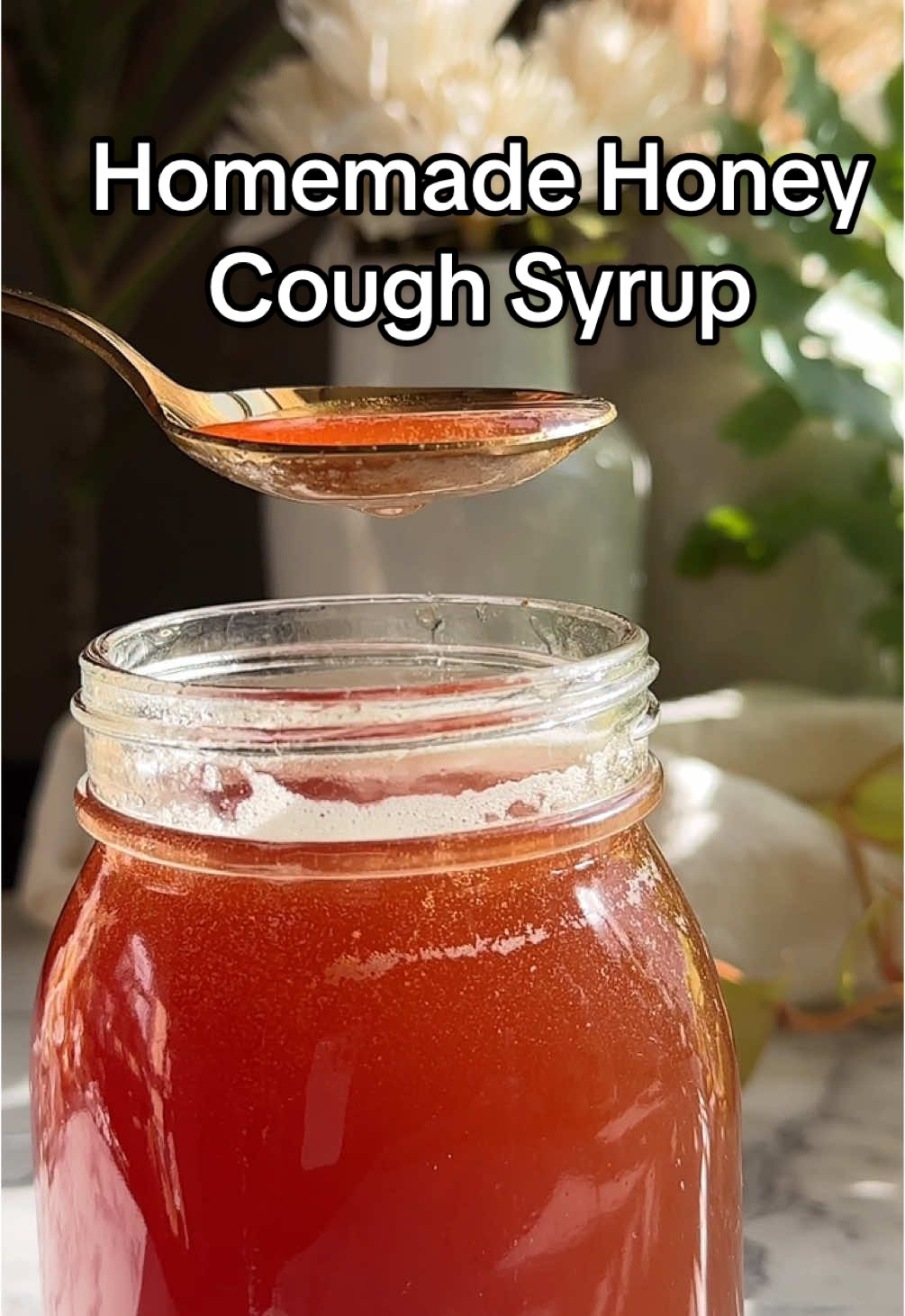 Homemade Honey Cough Syrup 🍯 Immune-Boosting Series | ep 10 #honey #coughsyrup #naturalremedy #homemadecoughsyrup  With 5 simple ingredients you have an incredibly effective natural homemade cough syrup that has high antimicrobial, antiviral, and antibacterial properties!  🐝Honey: Soothes the throat, suppresses coughs, and fights infections with antimicrobial properties. ▫️Onion: Reduces mucus and inflammation while boosting immune health. ▫️Garlic: Strengthens immunity and combats bacteria and viruses. ▫️Rosemary: Relieves respiratory discomfort and has anti-inflammatory benefits. ▫️Cinnamon: Warms the body, improves circulation, and has antimicrobial properties. Ingredients:  24oz Honey, plus more as needed to cover ingredients  1 large Garlic bulb  1 large red Onion 20g rosemary 3-4 stalks  2-3 Cinnamon stick  Place in a clean mason jar. Store on the countertop (out of any sunlight) and let in infuse overnight or up to 4 days, stirring occasionally. When ready to use, strain and store the honey in a clean mason jar in the refrigerator. It will last up to 2 months. Note: Avoid giving this syrup to infants under one due to the honey content.  I like to fill 2 oz jars with it and take it with me during my travels. It’s great to have on hand! Check out my website for more information. (Linked in bio)