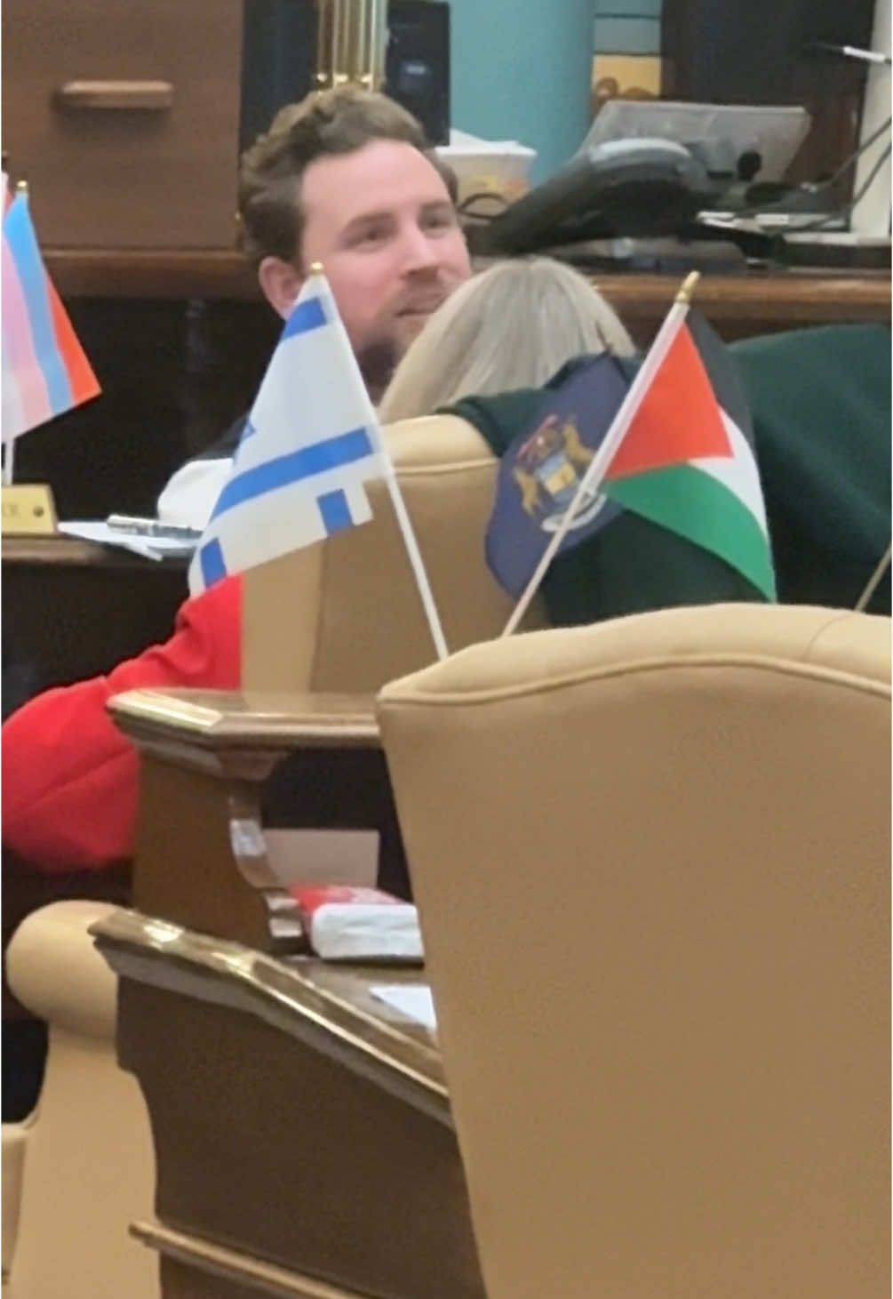 The flags Michigan senators attach to their desks while voting on bills. Republican senators dragged out the proceedings by demanding that bills be read aloud in full before voting, stretching the session to over 27 hours and keeping senators there all night. #michigan #senator #housebill #voting #flag #lansingmichigan #reporter #news #anchor #journalism #democrats #republicans 