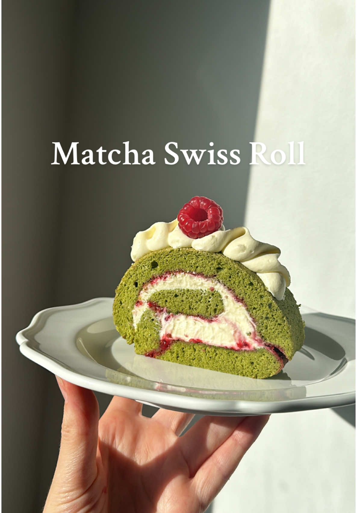 Matcha Swiss Roll 🍵🍰 Sponge Roll 5 eggs, separated 1/4 tsp cream of tartar 100g caster sugar (divided) 90g cake flour 10g @purematchateas KIYOMIDORI Premium Everyday Matcha 50ml full cream milk 50ml extra virgin avocado oil (or vegetable oil of choice) 1 tsp vanilla extract Cream Filling 250ml thickened cream 100g mascarpone (or cream cheese) 50g icing sugar 1 tsp vanilla extract 1/2 cup homemade or store-bought raspberry jam Fresh raspberries, to serve Method 1. Preheat the oven to 170°C fan forced (340°F). Line a 39cm x 27cm (15” x 10”) baking tray with baking paper. 2. Using an electric mixer fitted with the whisk attachment, whisk the egg whites and cream of tartar until foamy, then slowly add 50g of caster sugar and mix until stiff peaks form. 3. Whisk the egg yolks and remaining caster sugar in a large bowl until pale and creamy. Add in the milk, oil and vanilla, whisk until combined. Sift the flour and matcha powder over the mixture and whisk until smooth. Gently fold in half of the egg white mixture using a silicone spatula, then fold in the remainder until combined. 4. Spread the batter evenly over the baking tray using an offset spatula and bake for 12-15 minutes or until the top is lightly browned and the cake springs back when touched. 5. Flip the sponge out onto a wire rack, gently peel off the baking paper and place a fresh sheet of baking paper and flip over again (the bottom of the sponge will be the exterior of the roll). While the cake is still warm, roll it up from the short end with the baking paper. Allow to cool completely in this roll shape, approximately 30 minutes. 6. For the cream filling, place the mascarpone, icing sugar, and vanilla extract in the bowl of a stand mixer fitted with a paddle attachment and mix for 2-3 minutes until combined. Change over to the whisk attachment, add in the thickened cream and whisk until medium stiff peaks form. 7. To assemble, gently unroll the sponge and evenly spread over the raspberry jam, leaving a few centimetres at the end of the cake uncovered. Spread three quarters of the cream filling over the top of the jam and gently roll up the sponge from the filled side, being careful not to squeeze out the filling. Wrap in plastic wrap and refrigerate for a few hours to allow the cream to set. 8. To serve, use a serrated knife to cut into 1” slices and pipe remaining cream on top. If you have leftovers, refrigerate in an airtight container for up to 3 days. #matchaswissroll #matchacake #matcha #ceremonialmatcha #matchadessert #matchabaking #matchalatte #purematcha #festivedessert #dessertinspo #dessertrecipe #cakeinspo #christmasbaking #matchatea #christmasrecipes #swissroll