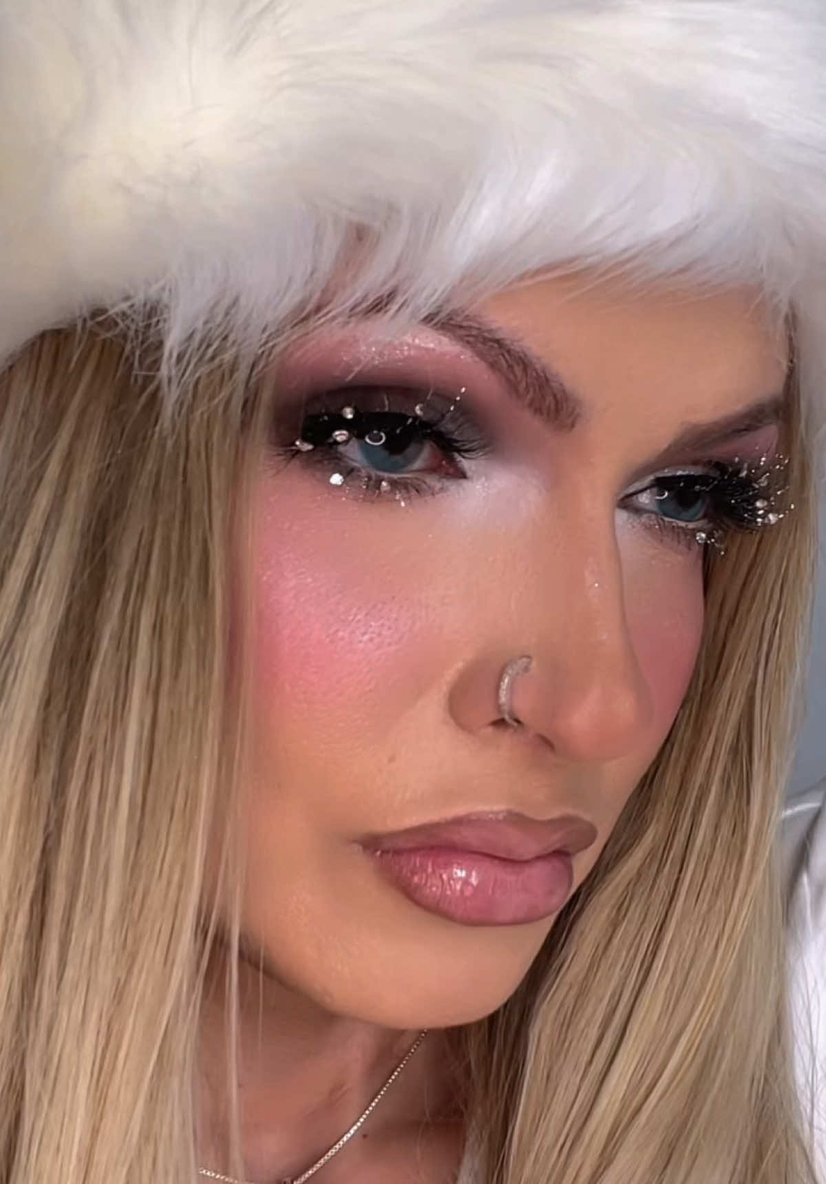 sugar plum fairy makeup with an icy cold girl vibe 🧚‍♀️❄️🎀✨  A combination of 2 of my winter looks with a twist, added glitter and rhinestones on the lashes like mini icicles. ❄️  Love the sugar plum fairy trend. Definitely gonna do some more. #makeup #sugarplumfairymakeup #eyeshadowlook #makeuplooks #holidaymakeup #makeupinspo #wintermakeup #hudabeauty #colourpop #beautycreations #christmasmakeup #eyeshadow #fyp 