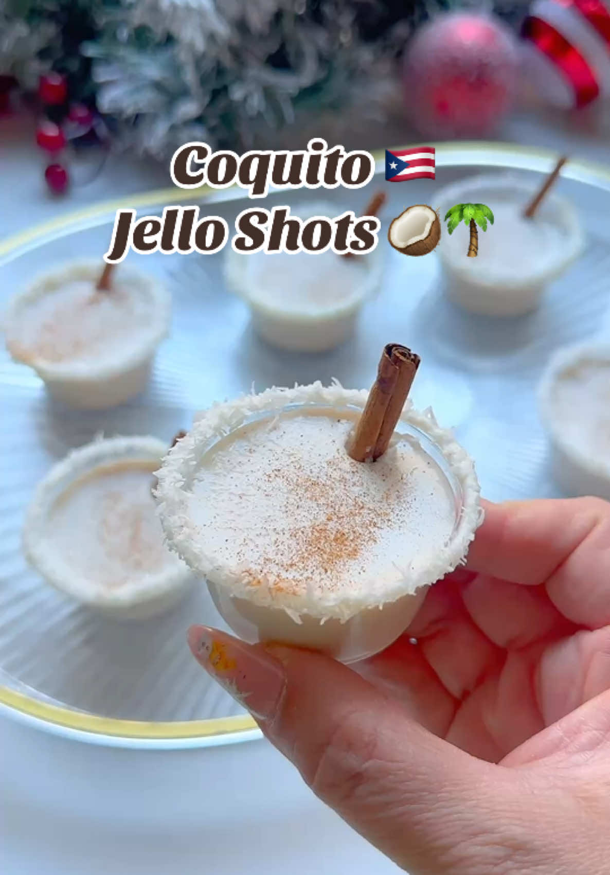 🥥🌴Feeling the holiday vibes with @rauwalejandro new album and these delicious Coquito Jello shots! Between this song and these shots ready to start teaching salsa lessons 😂💃🏻 These Jello shots are inspired by the Puerto Rican coconut beverage called, Coquito! It's a creamy coconut drink spiked with rum (you can make it without rum too). You'll find this beverage in every Puerto Rican household, including mine during the holidays! And you know me...I had to make them into Jello shots!🥥🌴🇵🇷 Drop 'Coquito' in the comments if you want the full tutorial! #coquito #coquitoseason #puertoricanfood #jelloshots #jelloshot #puertoricans #boricuastyle