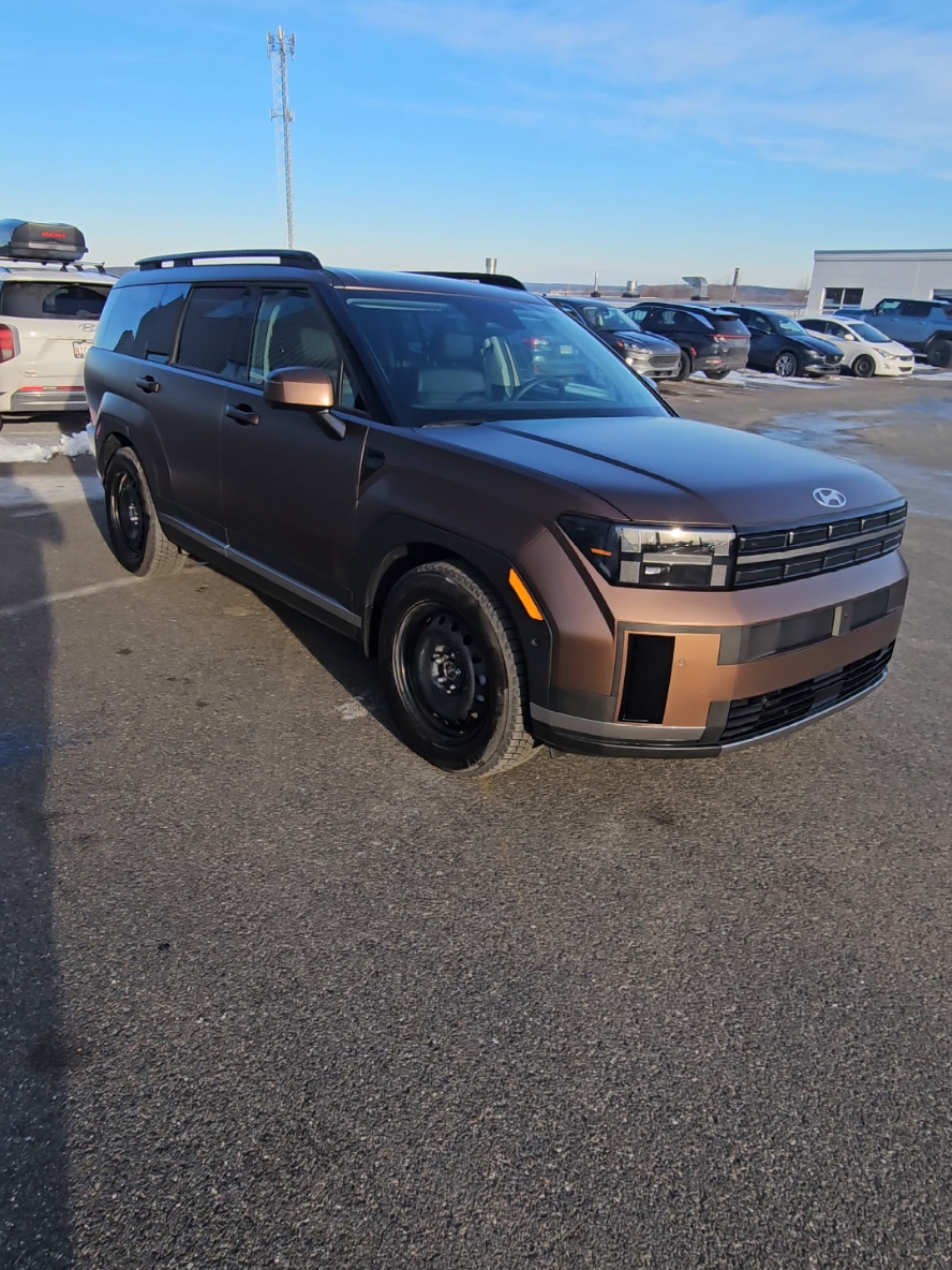 2024 Santa Fe Luxury in Earthy Brass Matte with winter tires mounted on steel rims. #2024SantaFe #SantaFeLuxury #EarthyBrass #MatteColor #WinterTires #SteelRims #Hyundai #HyundaiCanada #FrederictonHyundai #Fredericton #NewBrunswick #Canada #SteeleAutoGroup @Hyundai Canada 