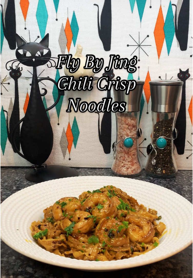 @FLY BY JING lovers you need to try their Chili Crisp Noodles! Bouncy, wavy ribbon noodles along with Chili Crisp, shallot sauce, black vinegar & dried chives deliver a punch of flavor unlike any other.  #noodles #ramen #chilicrisp #flybyjing  