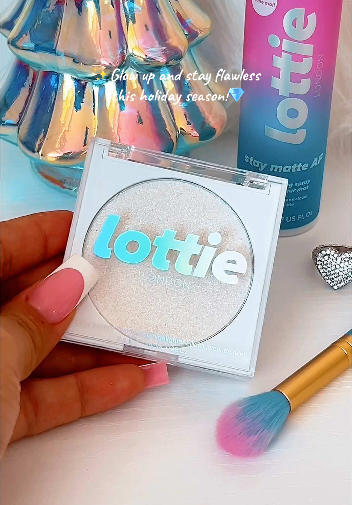 Just got this PR package from @LottieLondon , and I’m obsessed! ✨#Gifted #LottieLondon  Say hello to the Diamond Bounce Highlighter for that blinding glow 💎 and the Stay Matte AF Setting Spray to keep your look flawless all day! 💖 Perfect for turning up the extra this holiday season! Available now at @Walmart , @CVS Pharmacy , @Amazon , and us.lottielondon.com. These are must-haves for your makeup bag! #GlowGetter #MakeupMustHaves #FlawlessFinish