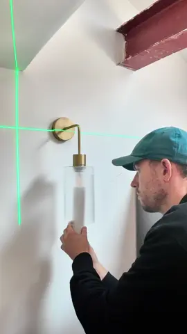 Wonky wall lights ❌  I’ve never installed wall lights before, but I love the ambient light they give off.  I was however concerned that I might install them wonky and I would seem them slightly out of level ever time I enter the kitchen.  So I got the laser level out to ensure they were millimetre perfect. Would you have wall lights in the kitchen? #DIY #homerenovation #kitchendesign #kitchenrenovation #kitchenlighting #lighting #ukhome #ukhomerenovation #homeimprovement 
