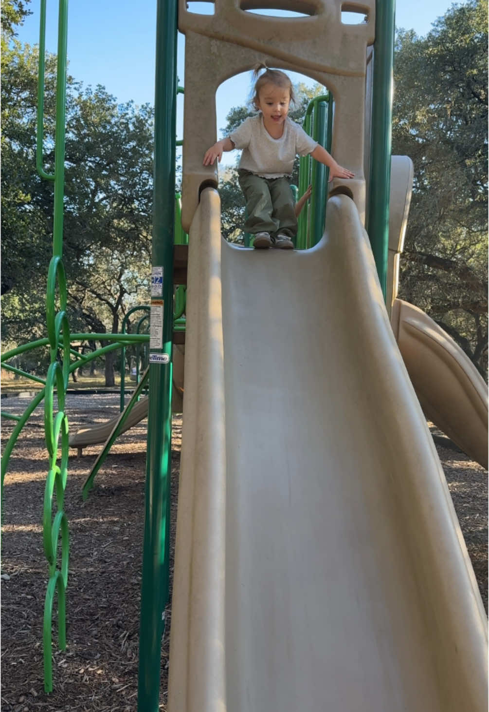 “Oh my” #funnytoddlers #sisters #slide #playground 