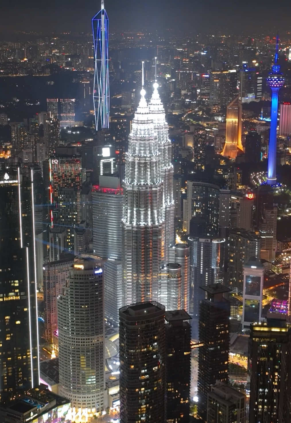 “25 years of Iconic Brilliance” Celebrating the Petronas Twin Towers 25th anniversary and their 2024 Global Icon Award. The show featured a mesmerizing display of music and light. #klcc #klcctheplace #petronastwintowers #kualalumpur #petronas #malaysia #aerialhyperlapse #djimavic3 #djimalaysia #djiglobal #djiphotography #djidrone  #aerialphotography #dronephotography #drone #dronestagram #droneoftheday #aerial #djiglobal #dronelife #drones 