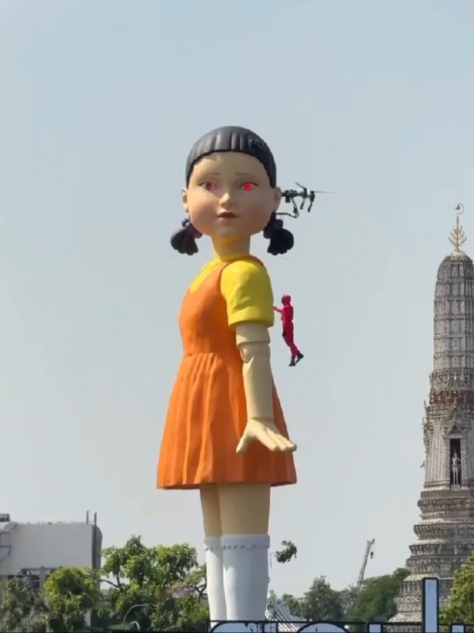 Experience the thrill of 'Squid Game' Season 2 in Bangkok! The world's largest Young-Hee doll is making waves along the Chao Phraya River, drumming up excitement for the new season premiering on December 26. The show was in ICONSIAM Park and also near Wat Arun.  Lets wait for the Premiere! #squidgamebangkok #squidgamenetflix #squidgameseason2 #bangkokthailand #สควิดเกมเล่นลุ้นตาย 