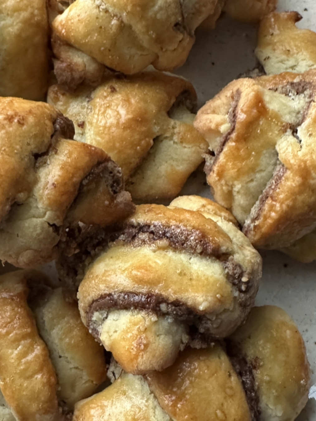 My NUTELLA RUGELACH! 🕎 🥐🍫 This is one of my favorite recipes to make for Hanukkah each year! The whole fam loves them and I know you're going to love them too. #NutellaRugelach #Rugelach #HanukkahRecipes #Hanukkah #Nutella