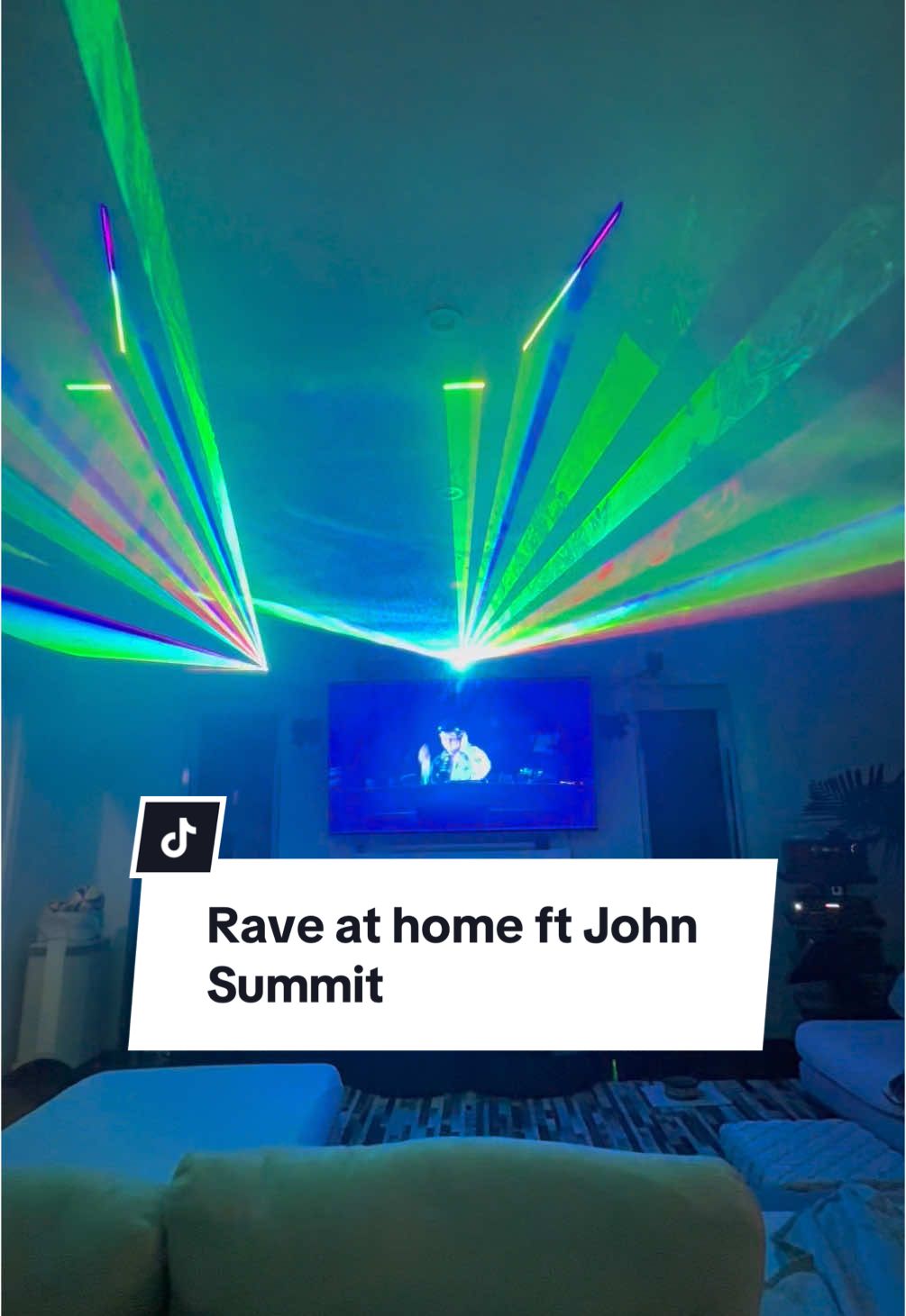 This is how us elder millenials party nowadays. Who needs the club when you have the club at home?! Disclaimer: my friend built these lasers himself so theres no links to share.  **UPDATE I have a link for the lasers, will be posting soon** PS we love @john summit 🤘🏼 we’ve seen him in LA, Puerto Rico, Tomorrowland and NOW our friends living room 😂  #johnsummit #lasers #lasershow #fyp #friendsmas #clubbing #edm 