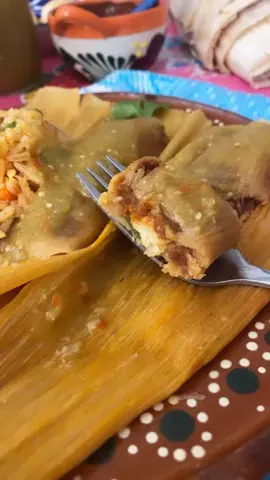 Tamal de Frijol con Jalapeño. Chile Colorado Beans and Jalapeño. Some with panela cheese.  For the Masa 2½ cups masa harina 2½ cups chicken broth ¾ cup pork lard(manteca) or vegetable shortening 1 teaspoon baking powder 1/3 c Ancho chile salsa for color mostly, it's optional Salt to taste For the Chile Colorado Beans: Fijoles Chinos 3 1/2-4 Cups pinto beans with liquid previously cooked 4 chile ancho 3 cloves garlic sliced 1 teaspoon cumin 1/2 teaspoon oregano Salt to taste 1 cup chicken broth 1 tablespoon oil or lard You Also Need 8 large pickled jalapeños cut into 6 strips each, set aside. If Adding Cheese 12 oz queso panela sliced into 24 equal, long thin portions Instructions Directions For The Beans Transfer the chile ancho to a glass bowl. Cover with water and cook in the microwave for 7 to 9 minutes, turning halfway through cooking time. Remove from microwave and let cool slightly. Or you can add them to a pot of simmering water and cook them for 10 minutes. While the chiles are cooling, in a large nonstick skillet, heat 2 tablespoon of oil or pork lard to medium heat. Add the beans and bring to a simmer. Drain the chile anchos and transfer to the blender. Add the cumin, oregano, garlic, salt, and ½ cup chicken broth. Blend on high until smooth, set aside. Add the chile ancho sauce to the beans, stir well to combine. When it comes to a boil, add the remaining chicken broth and reduce heat to a low simmer, stirring often. Taste for salt and while the beans are simmering, mash with a potato masher until desired texture. Continue cooking the beans until most of the liquid has evaporated. This process requires you to stir often so that beans don’t burn on the bottom of pan. It may take up to 35 to 45 minutes. Remove from heat and let cool completely before using as a filling for tamales.To Prepare Masa Whip the lard until creamy. Combine the masa harina, baking powder, and salt in a large bowl. Gradually mix in the dry ingredients to the whipped lard. Mix in the chile ancho sauce. Then gradually mix in the broth. Mix on medium high speed for 7-10 minutes. If masa is too thick, add a little more chicken broth. Keep masa covered with plastic wrap until ready to use. The original masa was white, with no added chile salsa. TASTE MASA FOR SALT! To Finish Tamales  While beans are cooling soak the corn husk in very hot water, using a heavy plate or bowl to keep them submerged. Soak for at least 45 minutes to an hour.Take a few of the corn husk out of water and shake off excess water. Cut the husk down to about 4 inches wide. They tear easy. Place the corn husk lengthwise in the palm of your hand with the wide side closest to you. Spread about 3 to 4 tablespoons of masa all over the bottom half of husk. It’s ok to leave a small border on the sides of husk. Place a heaping tablespoon of bean filling (2 tablespoons) and 1-2 jalapeño strisp, lengthwise down the center of the tamale. If adding cheese, add one piece. Fold one side in first, then the other side (it should overlap a little on the first fold). Fold down the top flap down and lay tamale seam side down until ready to cook. Repeat until all tamales are done.  Prepare large steamer pot or tamalera by filling the bottom with water. add a pennies (coins). Insert the steamer and arrange all of your tamales standing up (open side up) around the edges of pot . If tamales are loose in pot, add a little foil paper or extra corn husk to secure that the tamales won't fall over during cooking time. Cover tightly and turn heat to high to get a quick boil going. Reduce heat and set timer for 45 minutes. You will hear the coin rattling. If you do not hear it, you need to add more hot water quickly. After 45 minutes add another 1 1/4 cups of water. Steam for another 35-40 minutes. Carefully take out one tamal and cool for 6-7 minutes. If the masa peels away from husk, then the tamales are ready. If not, steam for another 15 minutes. Remove entire pot from heat and let stand for 30 minutes before serving. Yields 24 small 