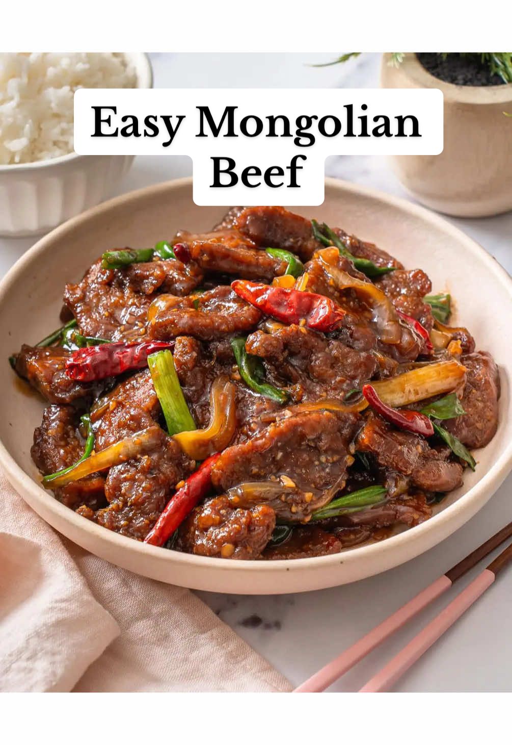 Easy Mongolian Beef 😍 This popular Chinese-American dish features crispy fried beef in a sweet and spicy aromatic filled sauce.  Grab the recipe on my website linked in bio 💕 . . .  #EasyRecipes #chinesefood #recipes #recipesoftiktok  