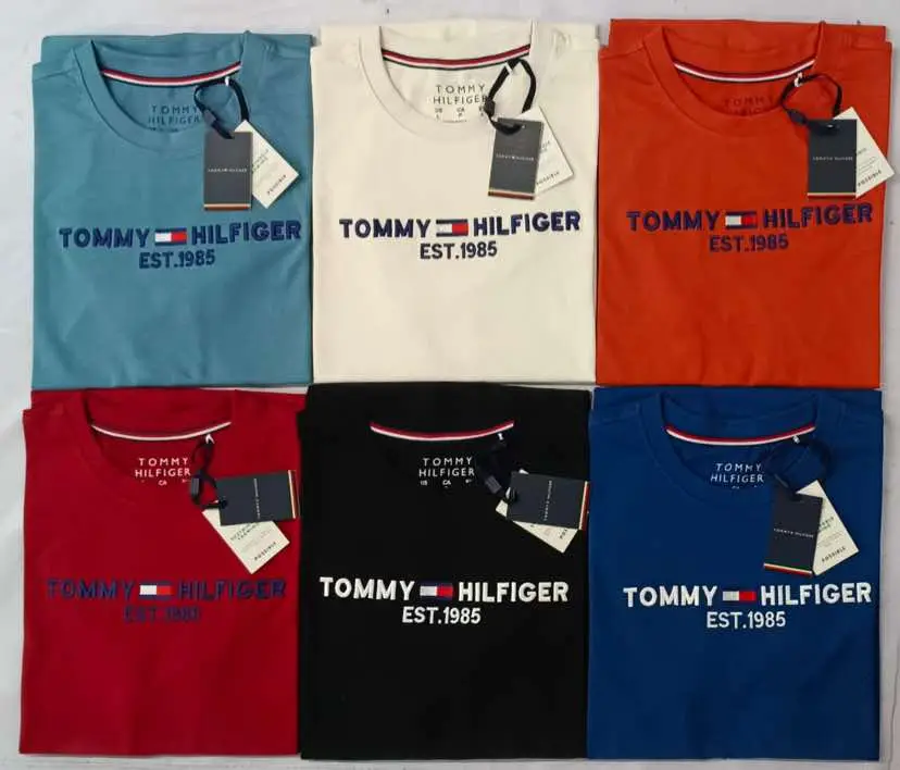 *Embroidery Premium Quality Men's Short sleeve T-shirt*  *Brand: Tommy Hilfiger*  Fabrics: 180 GSM S/J 100% Cotton  Colors: 6 As Per Pictures  Size:  M  L  XL 2XL  Ratio: 2  3  2  1  *Price: $ Pcs Including shipping for USA 🇺🇸 and Canada  🇨🇦*  Price: €Pcs Including shipping for France 🇫🇷 Italy  🇮🇹 Germany 🇩🇪 Spain 🇪🇸 Netherlands 🇳🇱 Poland 🇵🇱 Portugal 🇵🇹  Denmark 🇩🇰 Sweden 🇸🇪  Price: $ Per Including shipping for Australia 🇦🇺 the UK 🇬🇧  Delivery time:12-15 Days for America🇺🇸  Delivery time: 20-25 days for Europe🇪🇺 👉 *********Contact us for pricing **********