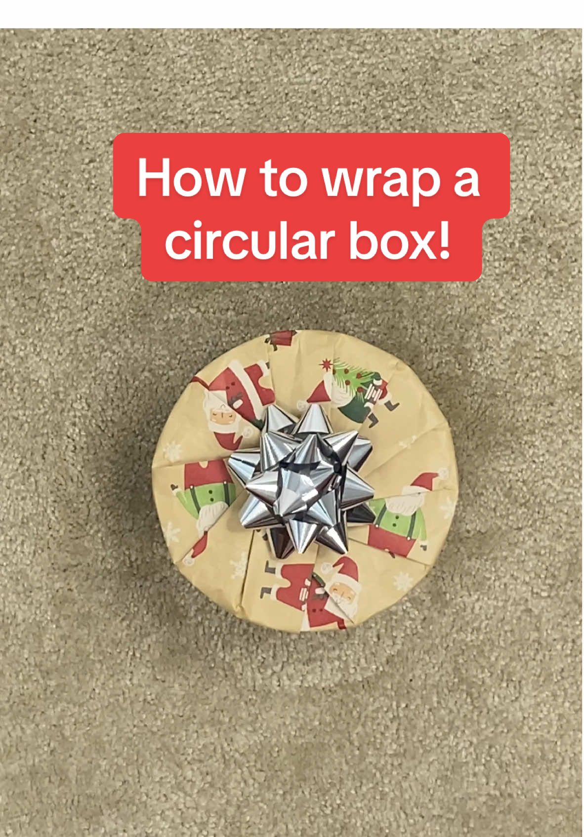 Replying to @Denedraa 🍃 How to wrap a circular box! #wrappingpresents #giftwrapping 