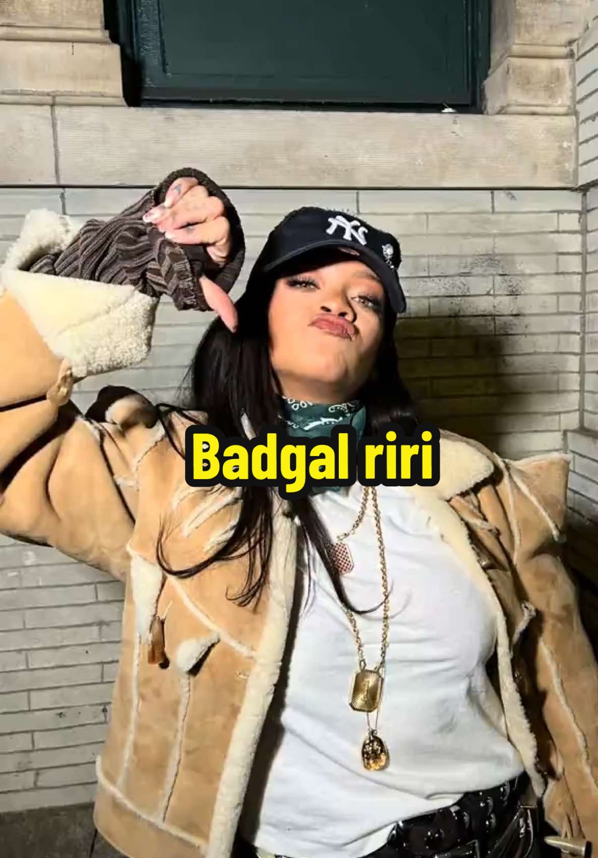 @badgalriri is wearing  Jacket @dior  Pant @ysl  Bandana #canal st •  🎤 @ajay_porter  🎥 @biig_c • #rihanna #christmas #nyc #fitcheck #louisvuitton #riri #badgalriri 